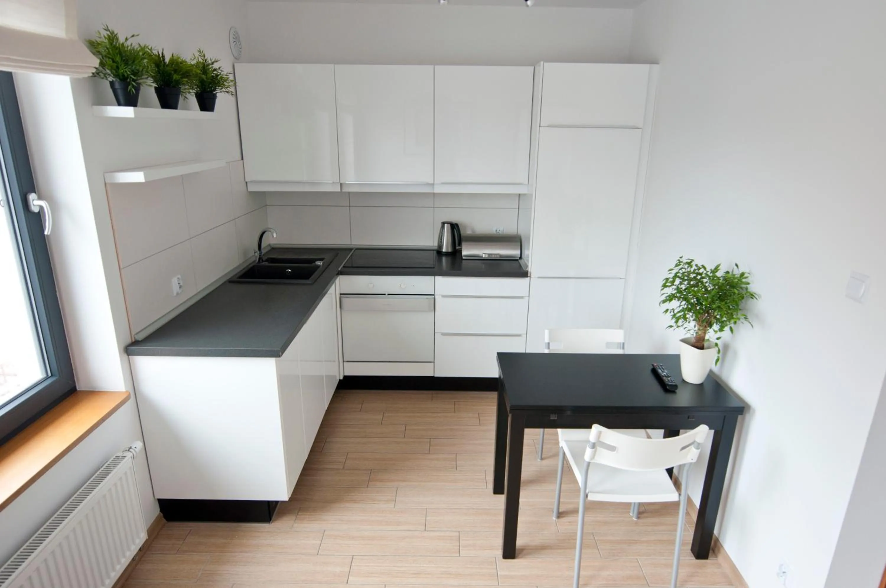 Kitchen or kitchenette in Apartamenty Mesa Grill Restaurant Cafe