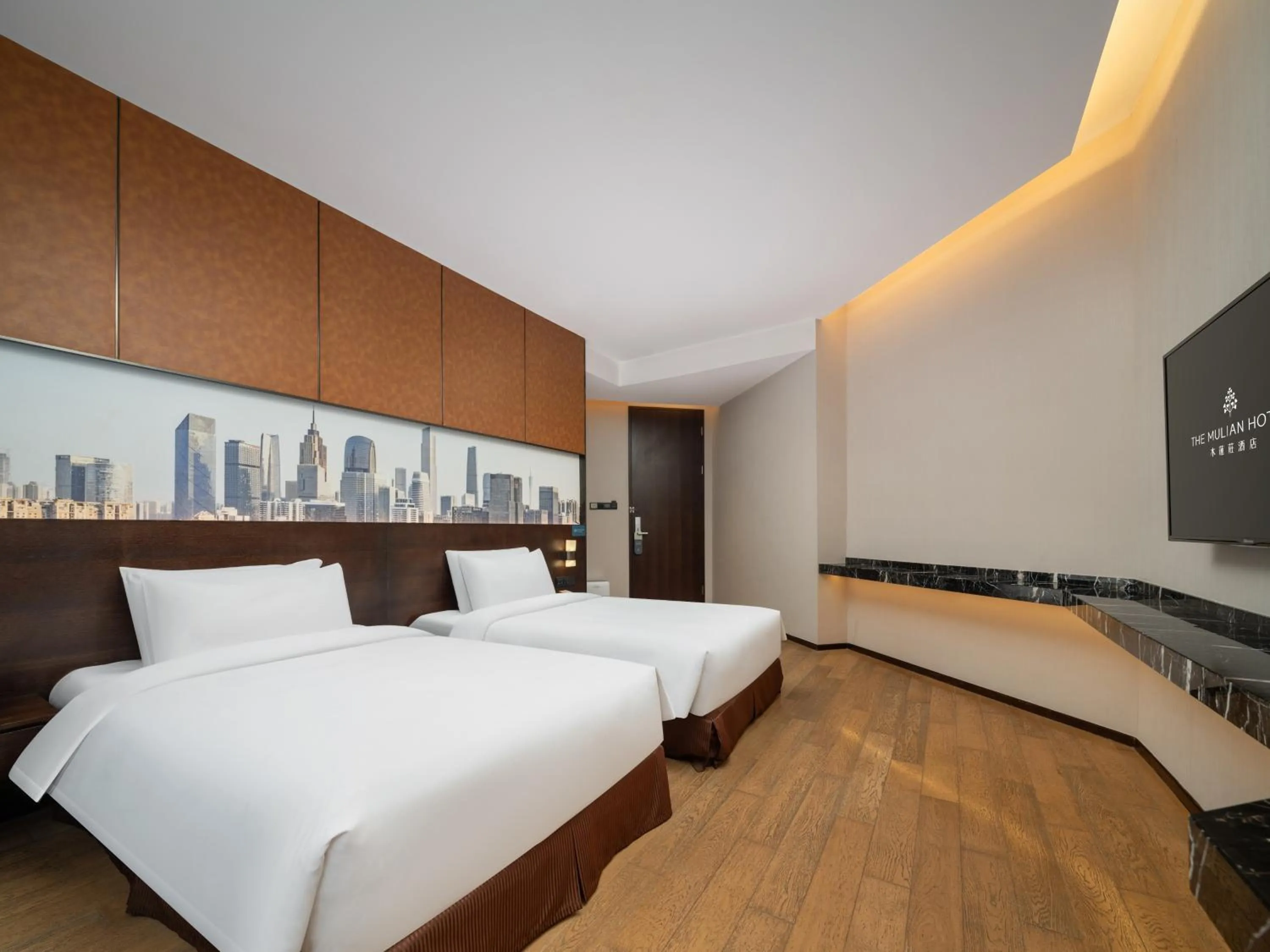 Photo of the whole room, Bed in The Mulian Hotel Guangzhou Zhujiang New Town-Canton Fair Free Shuttle Bus