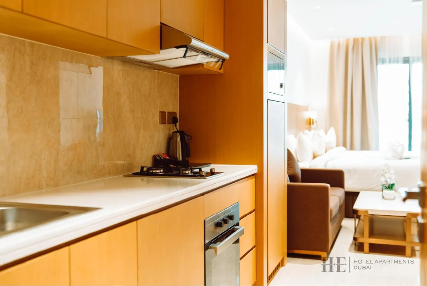 Kitchen or kitchenette in HE Hotel Apartments