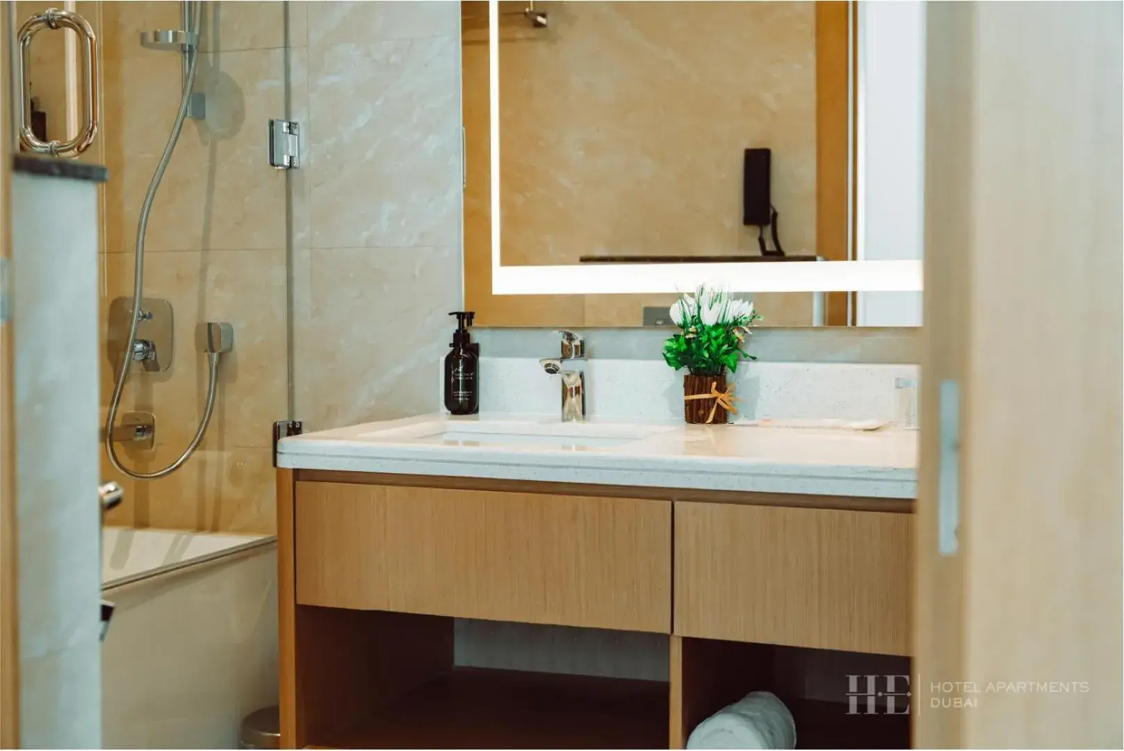 Bathroom in HE Hotel Apartments Bathroom in HE Hotel Apartments