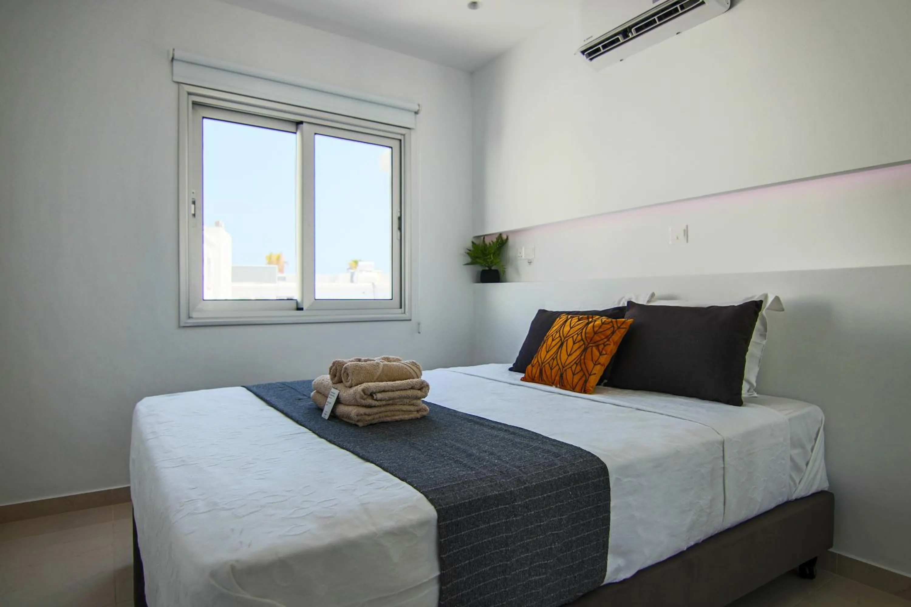 Bed in Phaedrus Living: Seaside Luxury Flat Lighthouse 65