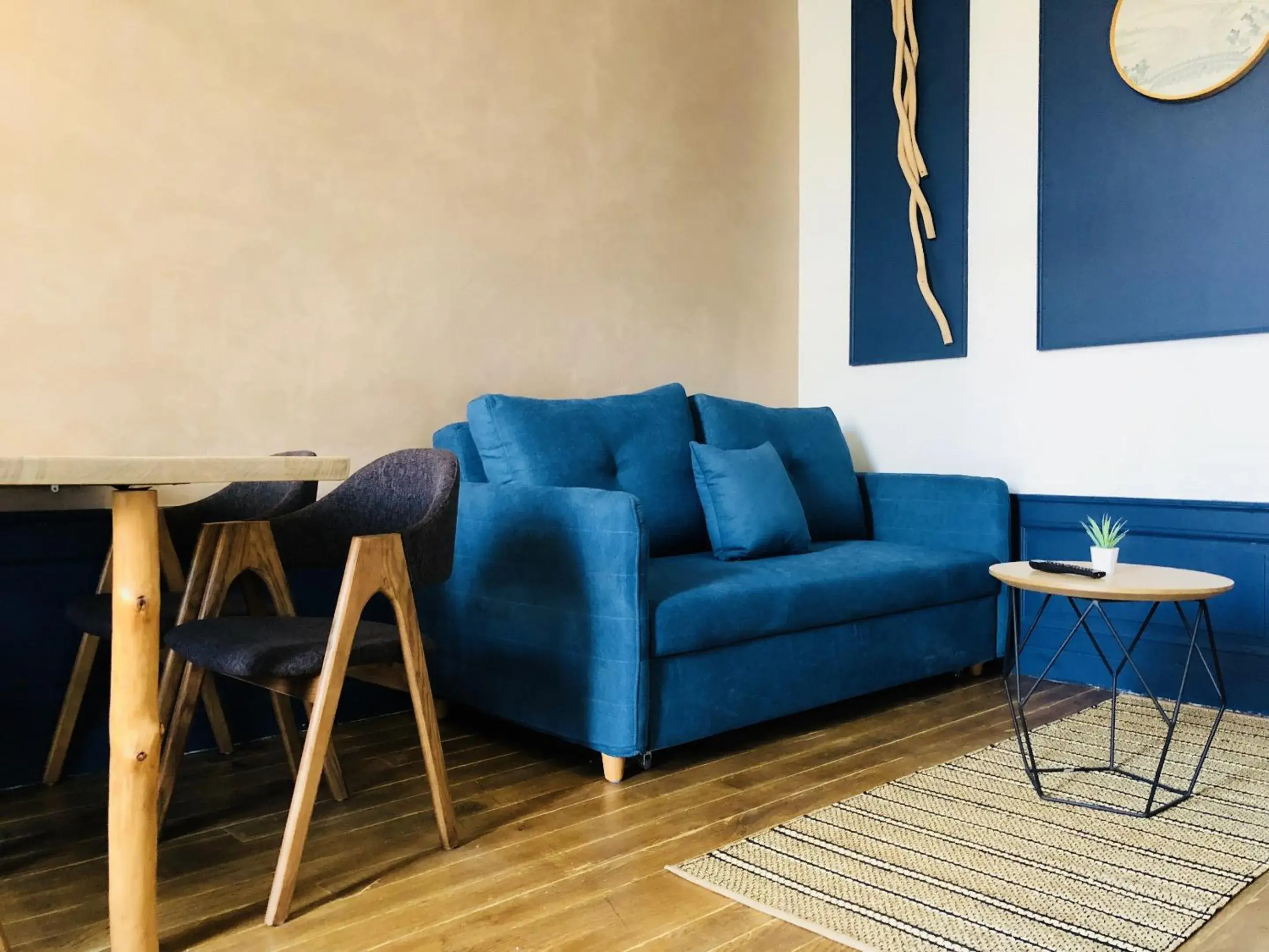 Living room in Meublés de l'Arsenal cœur de ville ! Living room in Meublés de l'Arsenal cœur de ville !