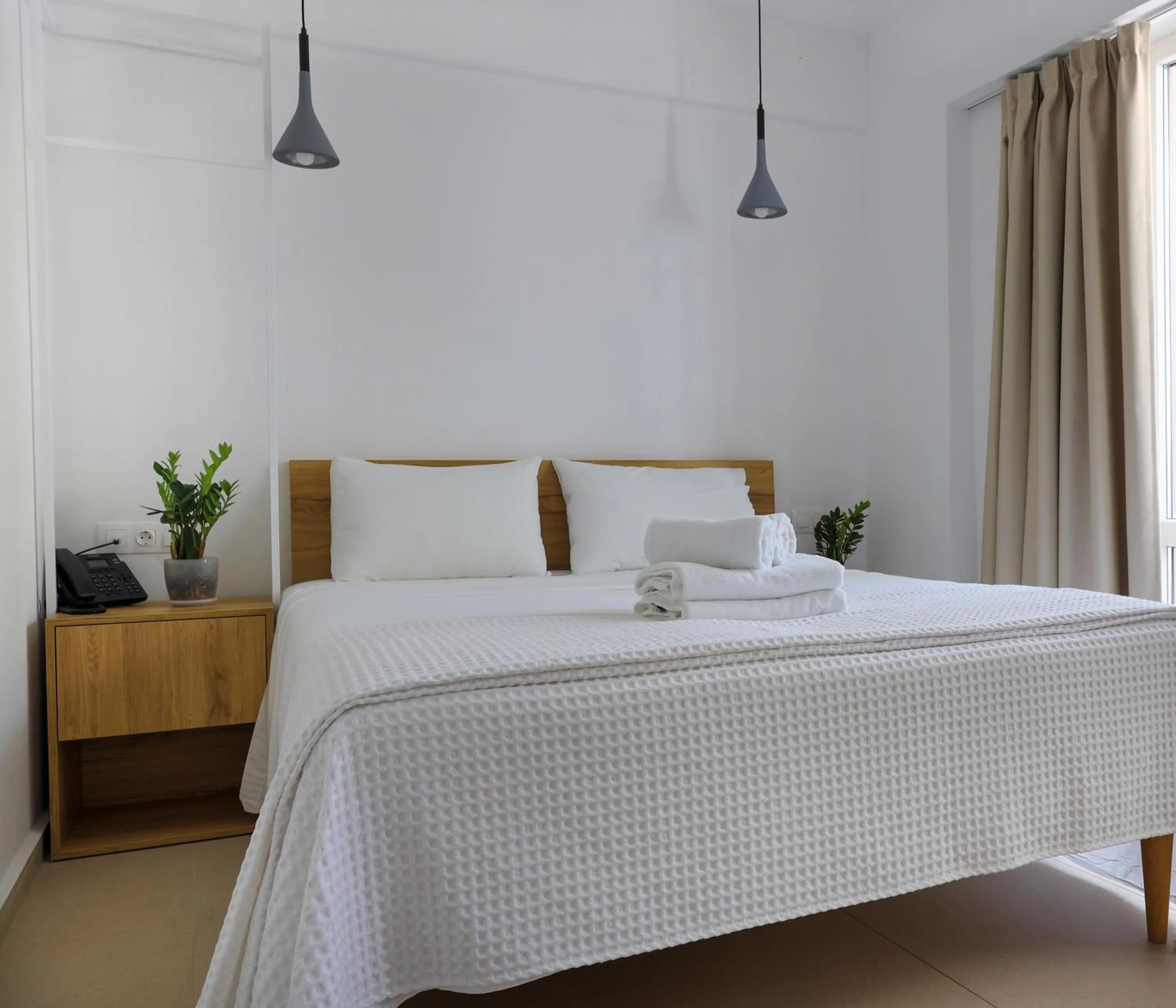 Bed in Sea Breeze Hotel