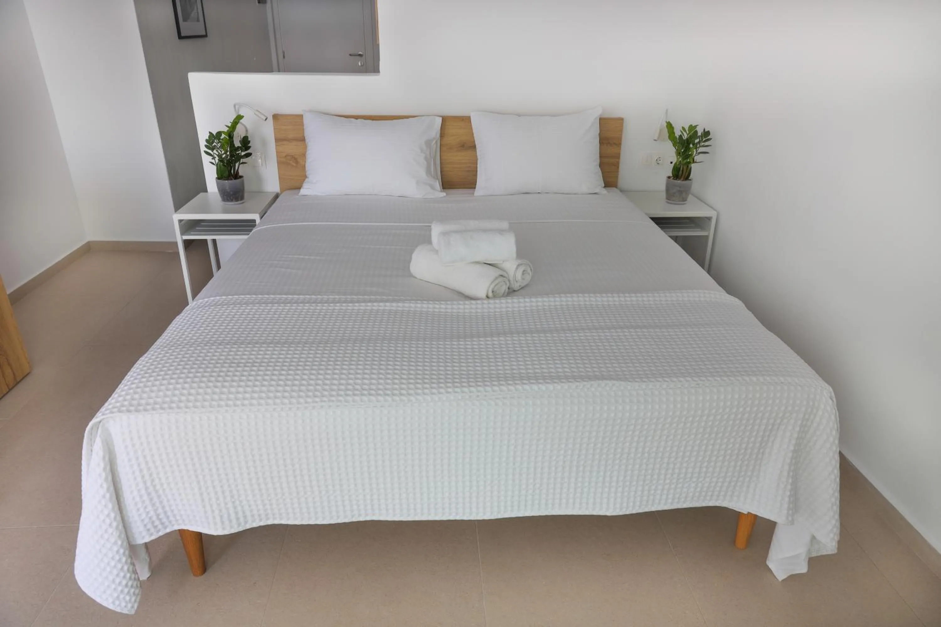 Bed in Sea Breeze Hotel
