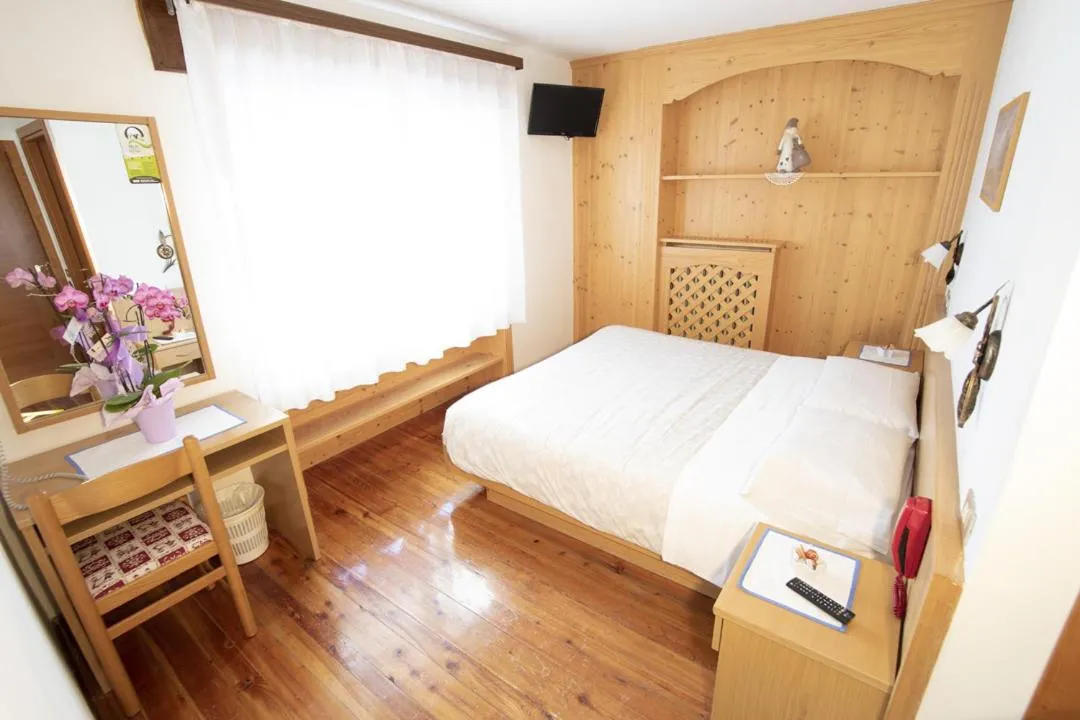 Bed in Hotel Edelweiss