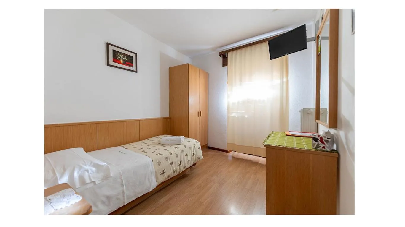 Bed in Hotel Edelweiss