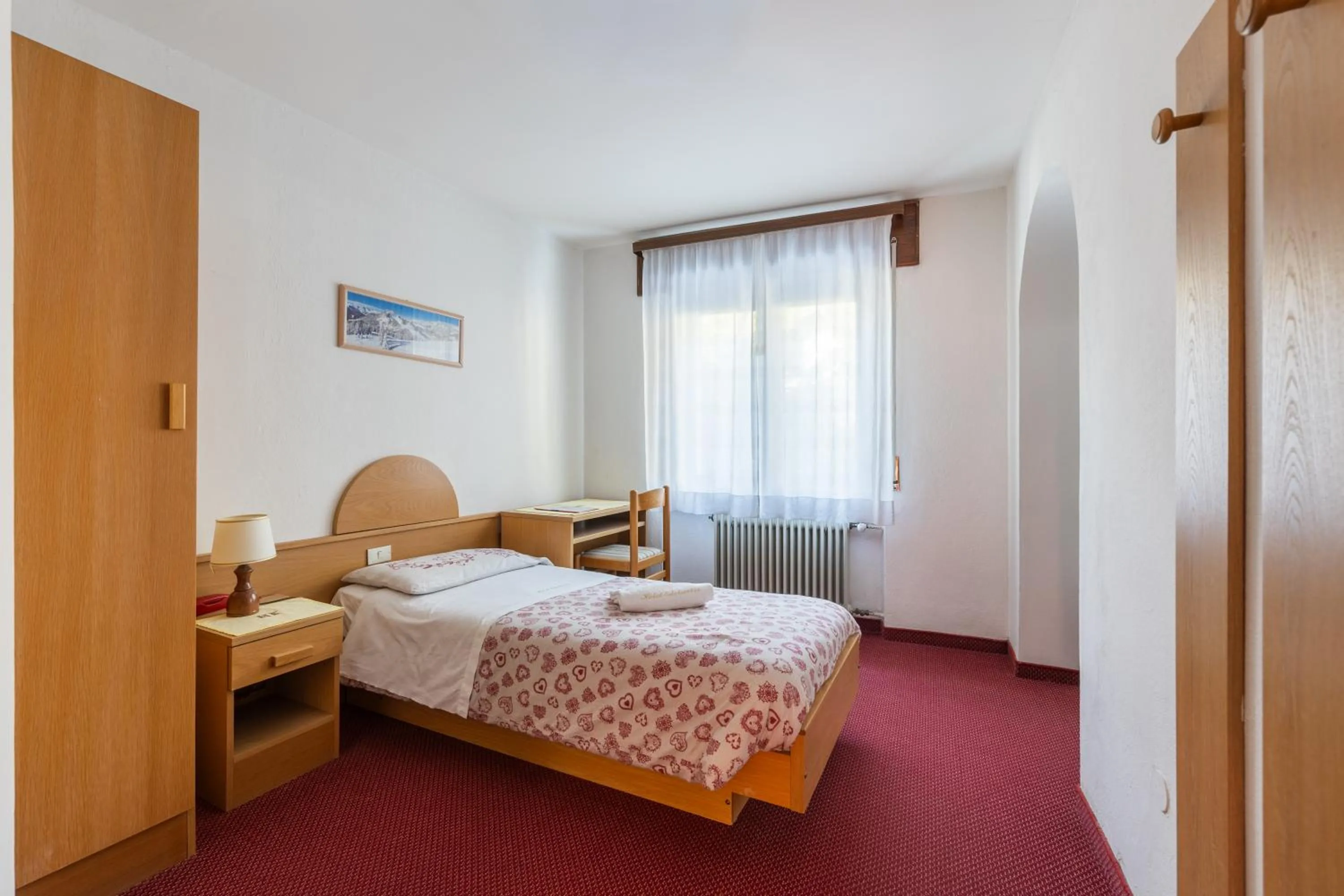 Bed in Hotel Edelweiss