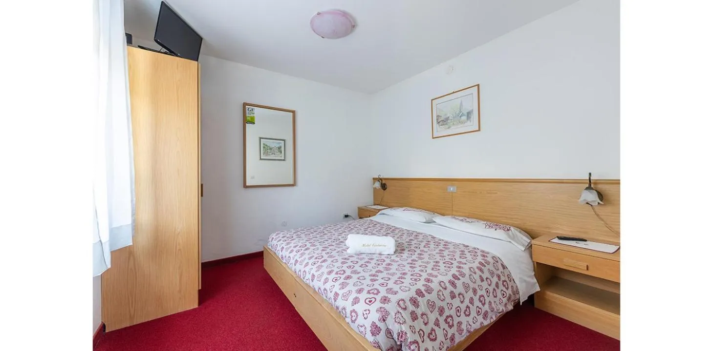 Bed in Hotel Edelweiss
