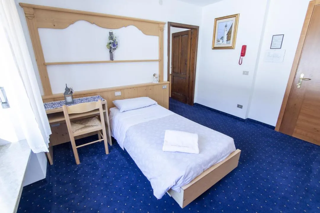 Bed in Hotel Edelweiss