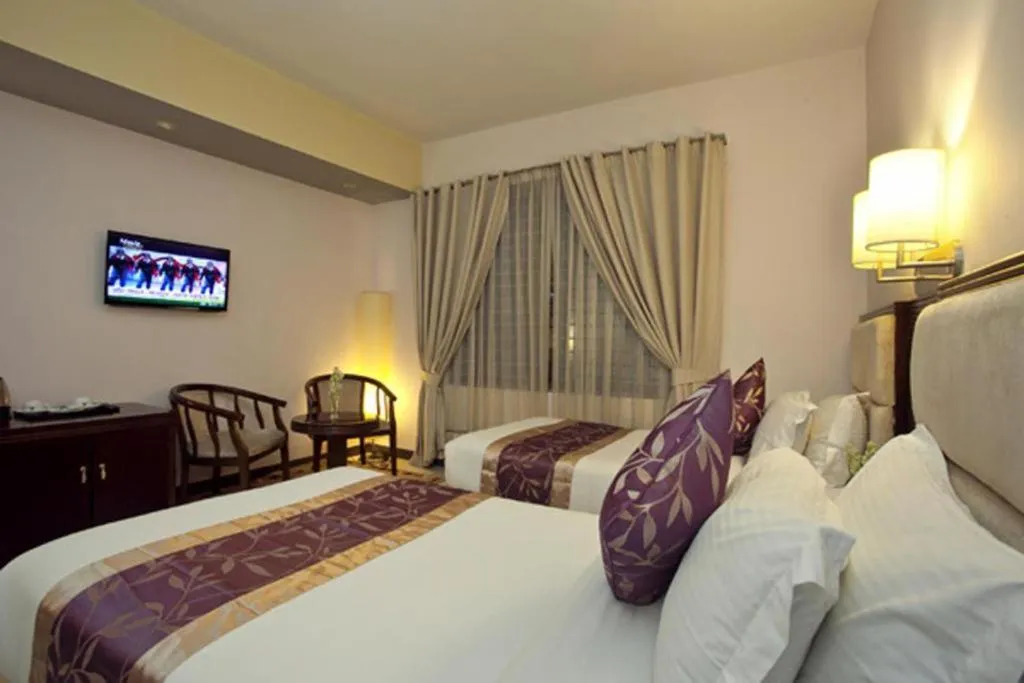 Bed in Hotel Star Pacific