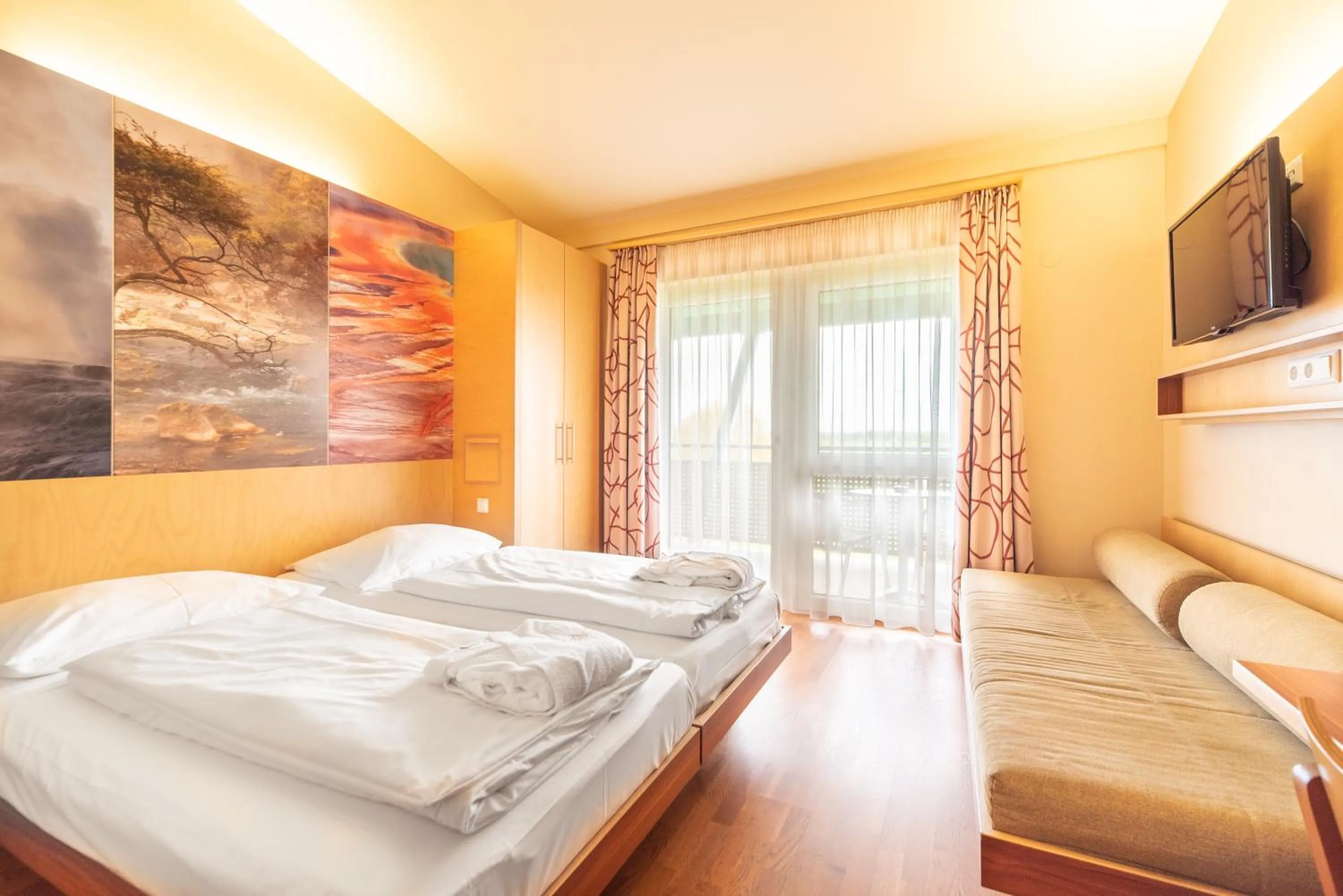 Photo of the whole room, Bed in Vulkán Wellness Hotel & Camping