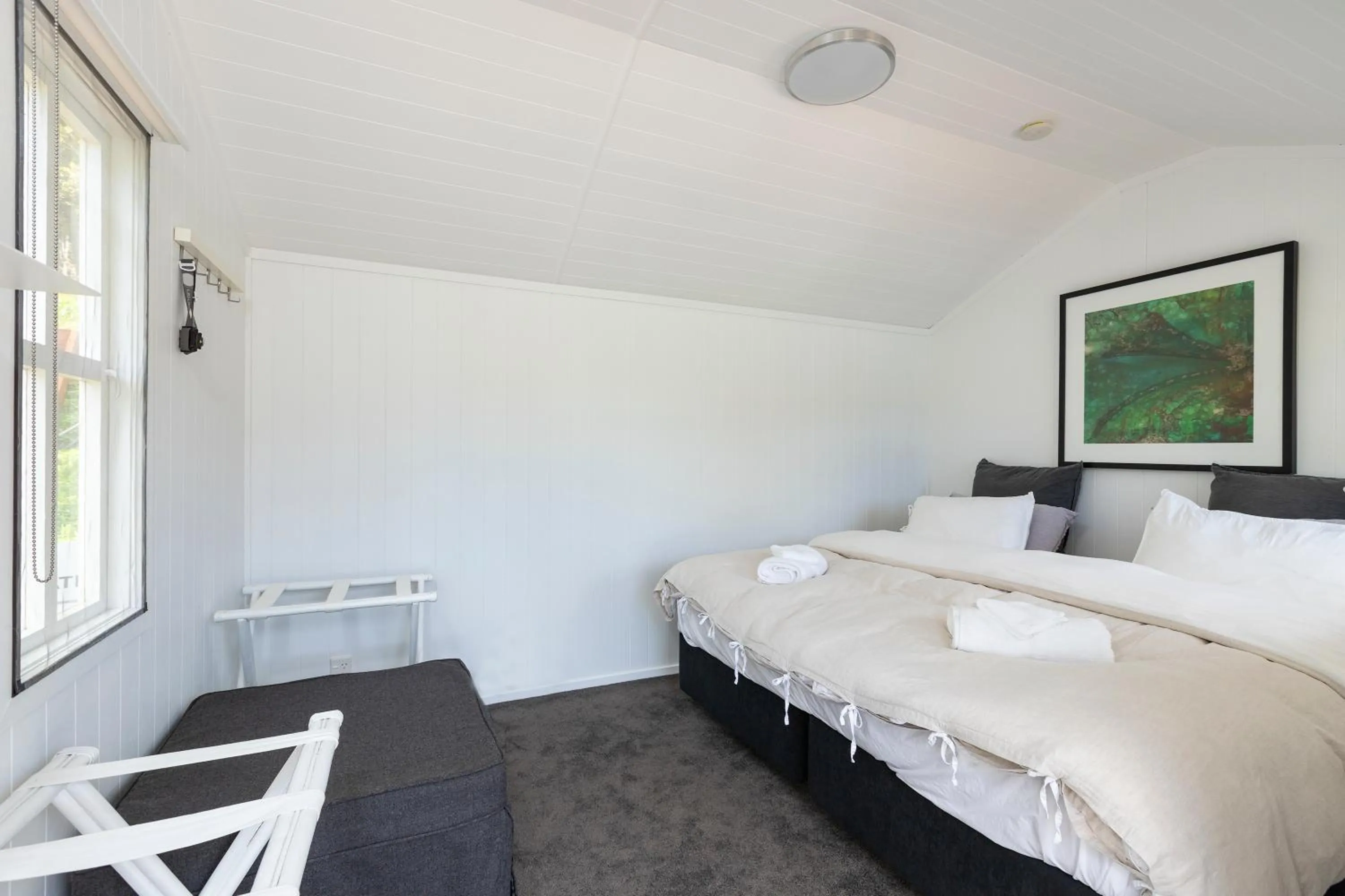 Photo of the whole room, Bed in Kawau Lodge Boutique Resort