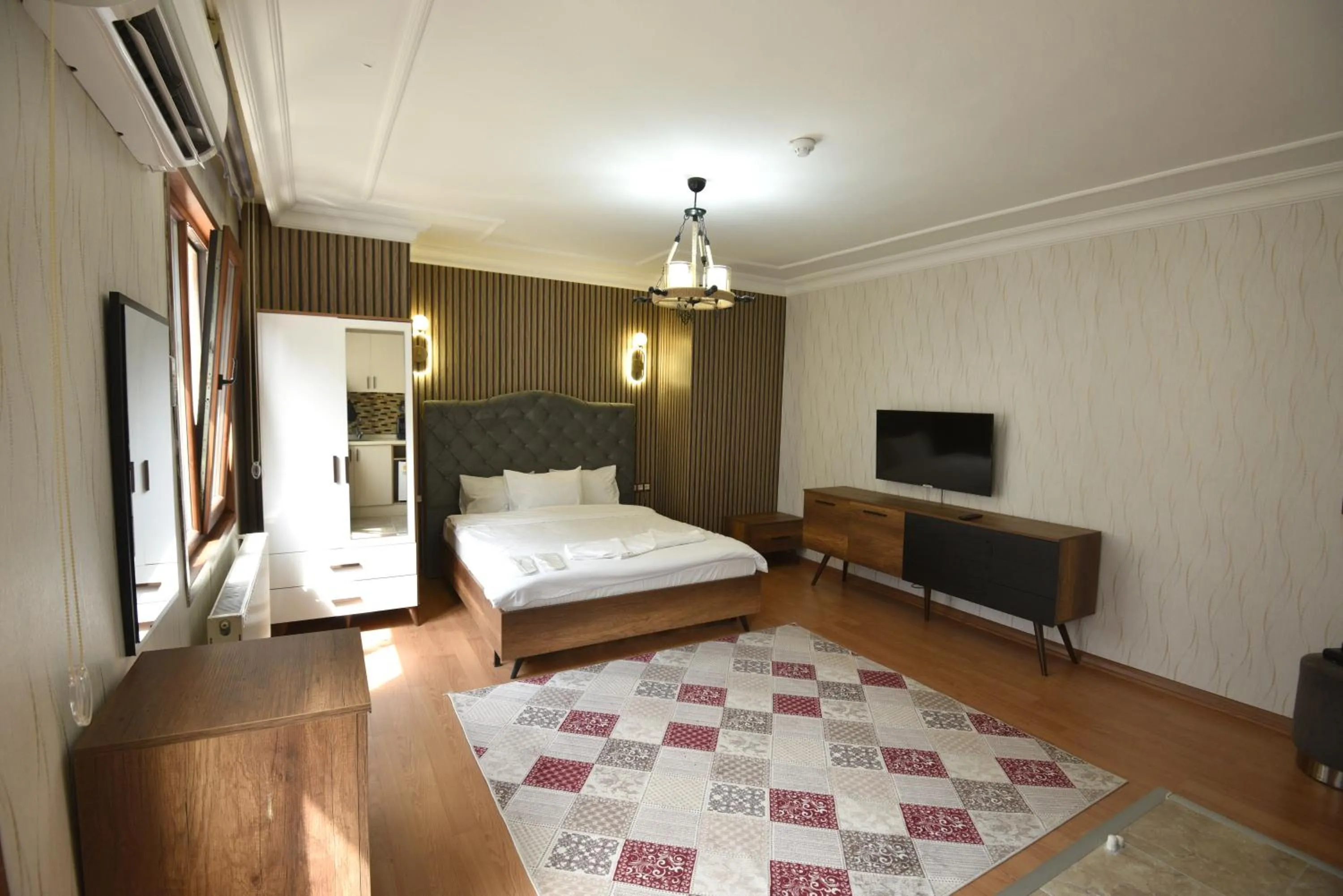 Photo of the whole room, Bed in Cihangir by Aydin Suite Hotel