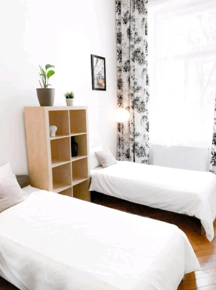 Bed in Gallys Apartments