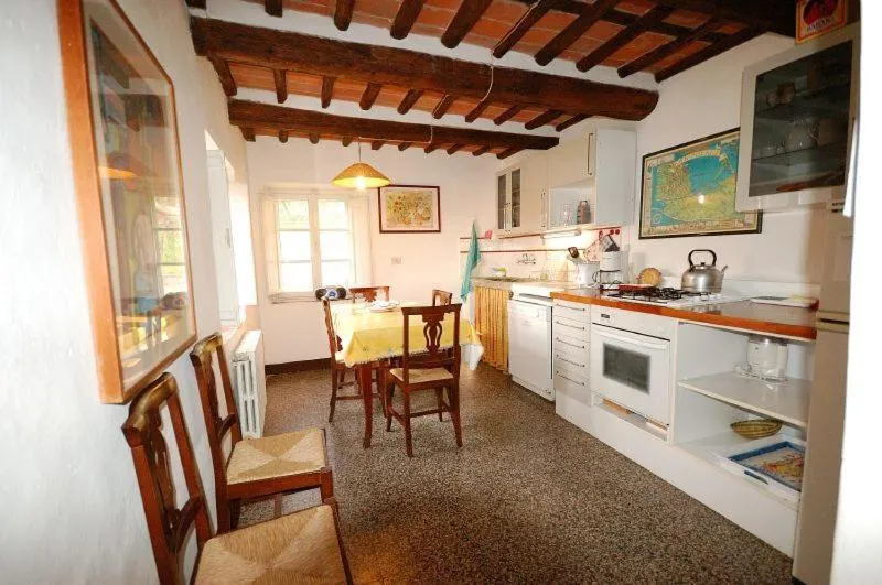 Kitchen or kitchenette in Fattoria di Fubbiano
