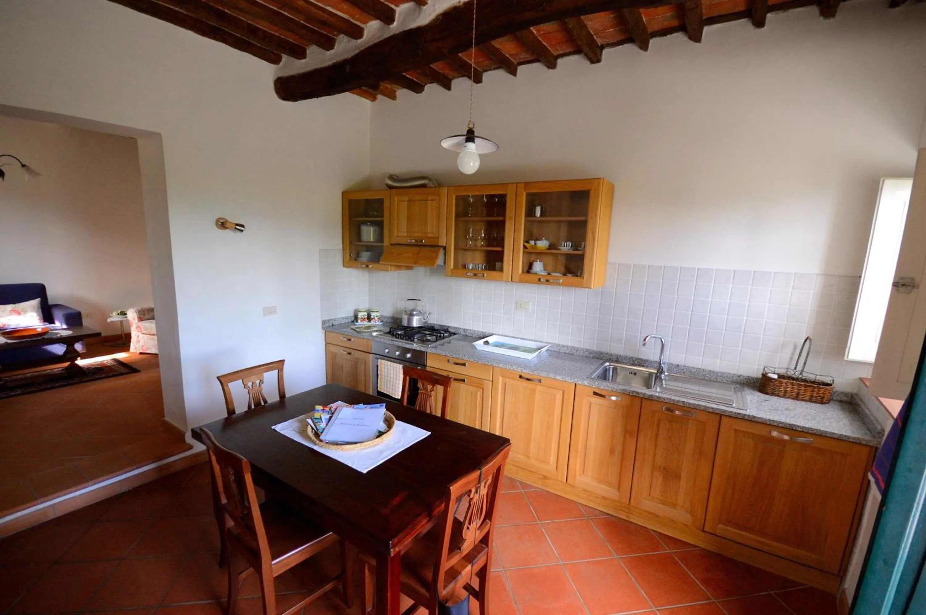 Kitchen or kitchenette in Fattoria di Fubbiano