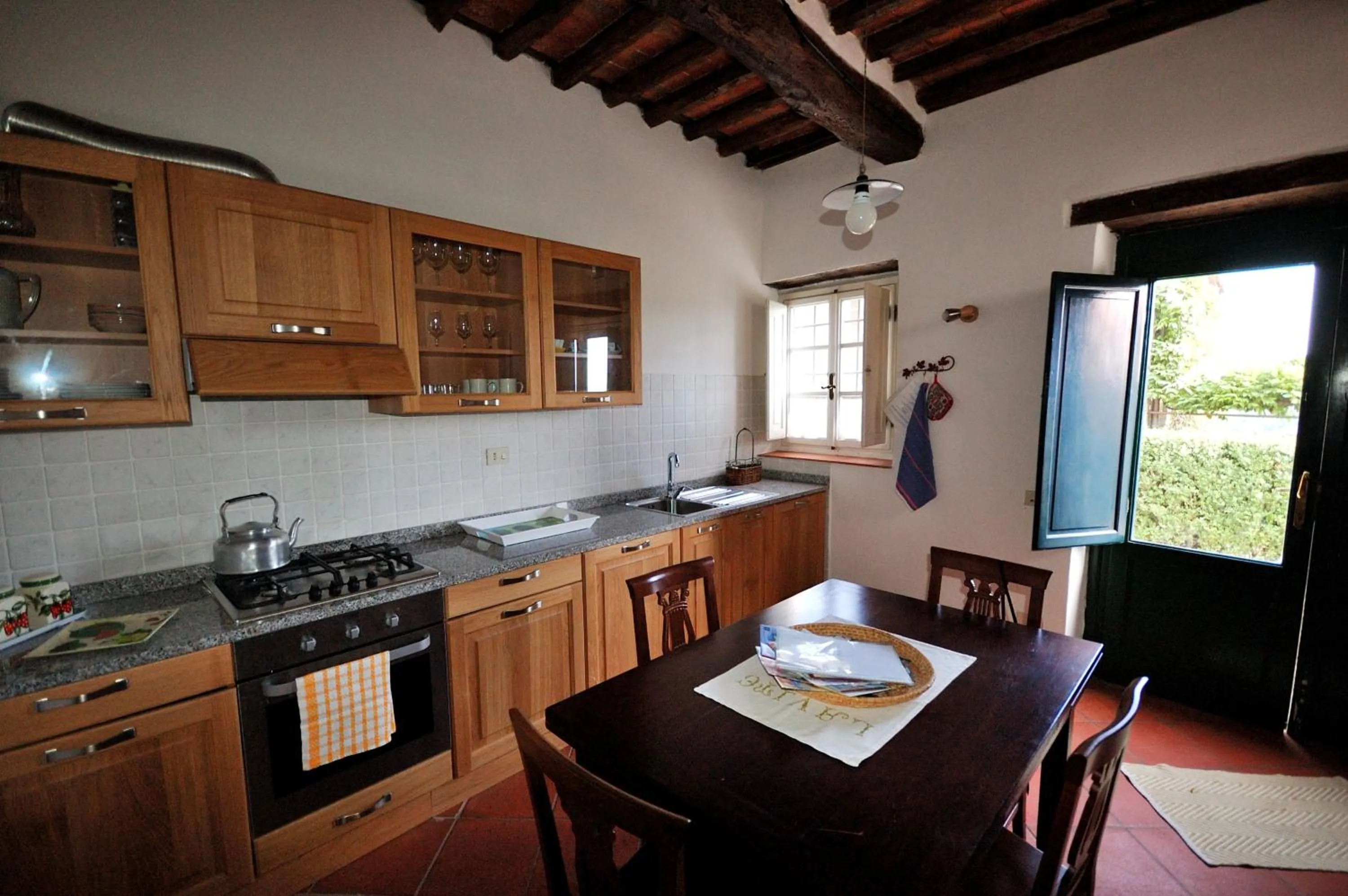 Kitchen or kitchenette in Fattoria di Fubbiano