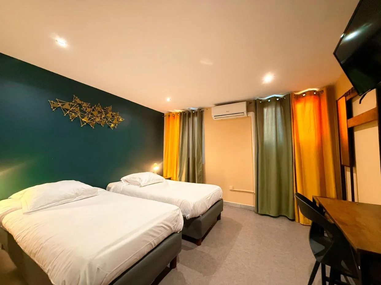 Bed in Hôtel Beauséjour