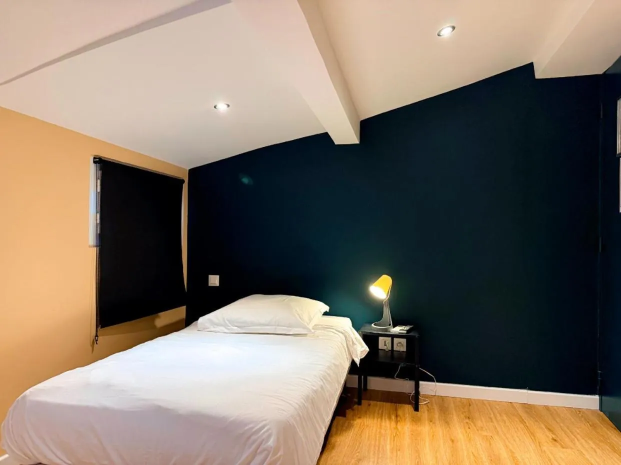 Bed in Hôtel Beauséjour