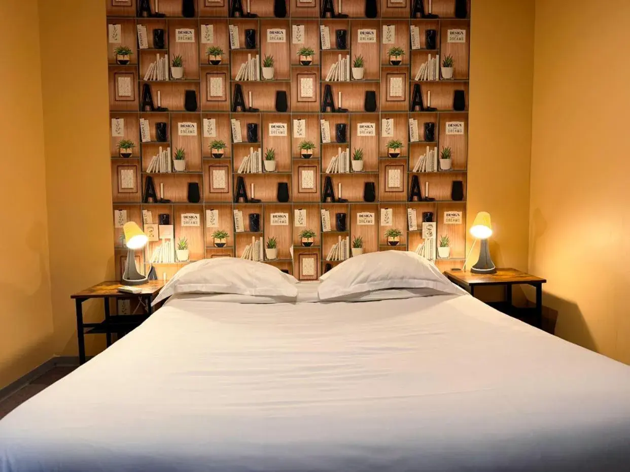 Bed in Hôtel Beauséjour Bed in Hôtel Beauséjour