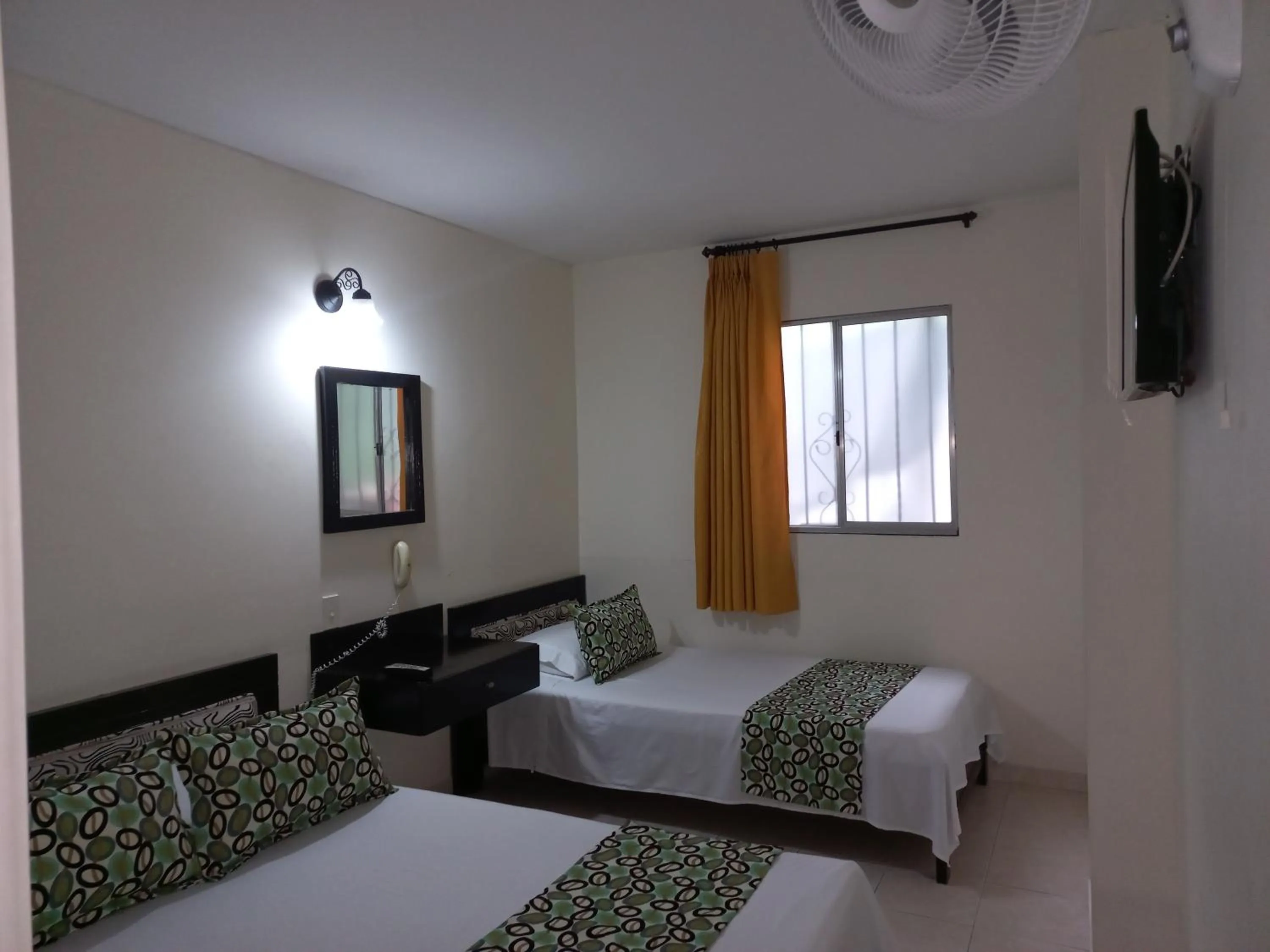 Bed in Hotel Los Tunjos