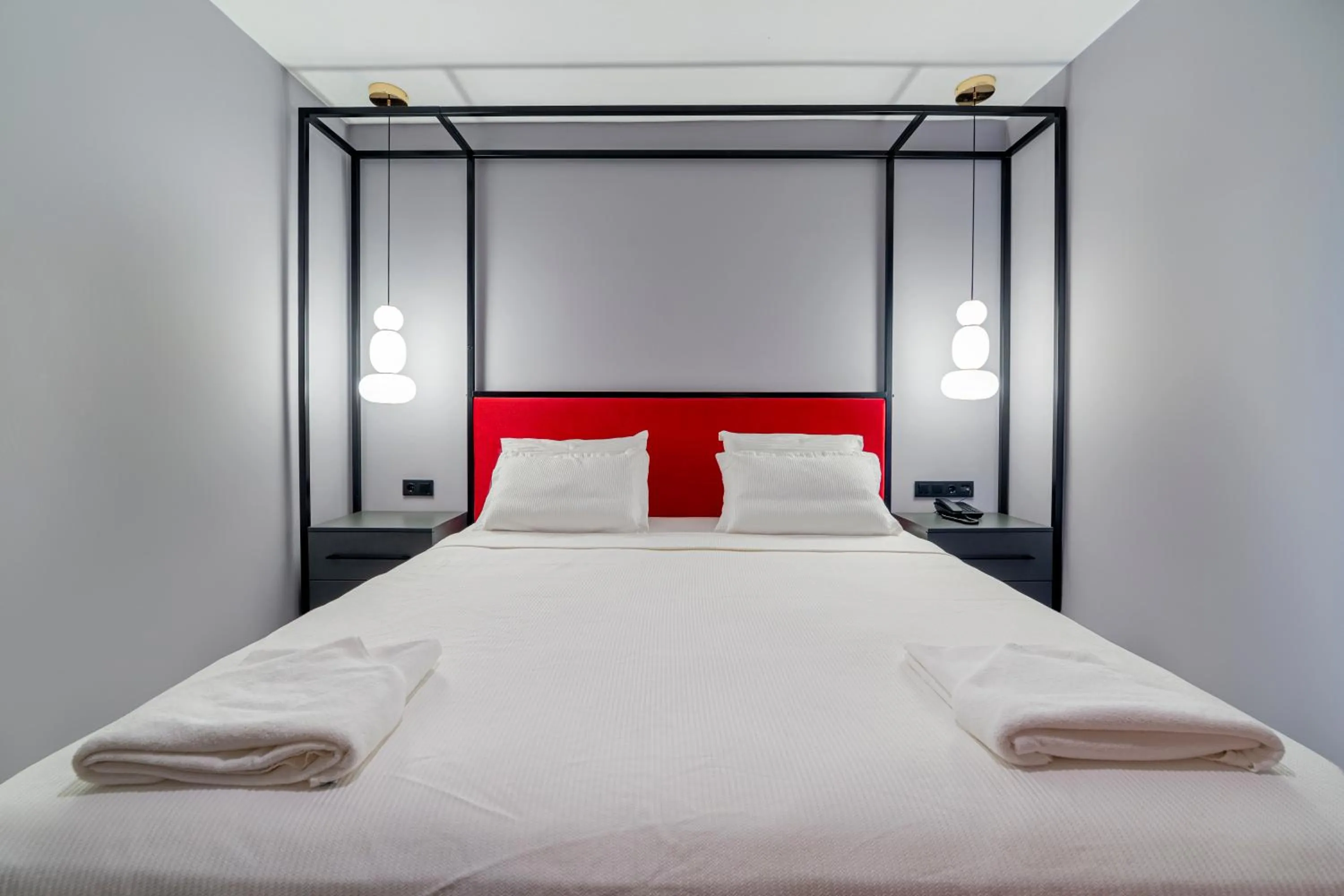 Bed in Aria Riva Apart Hotel