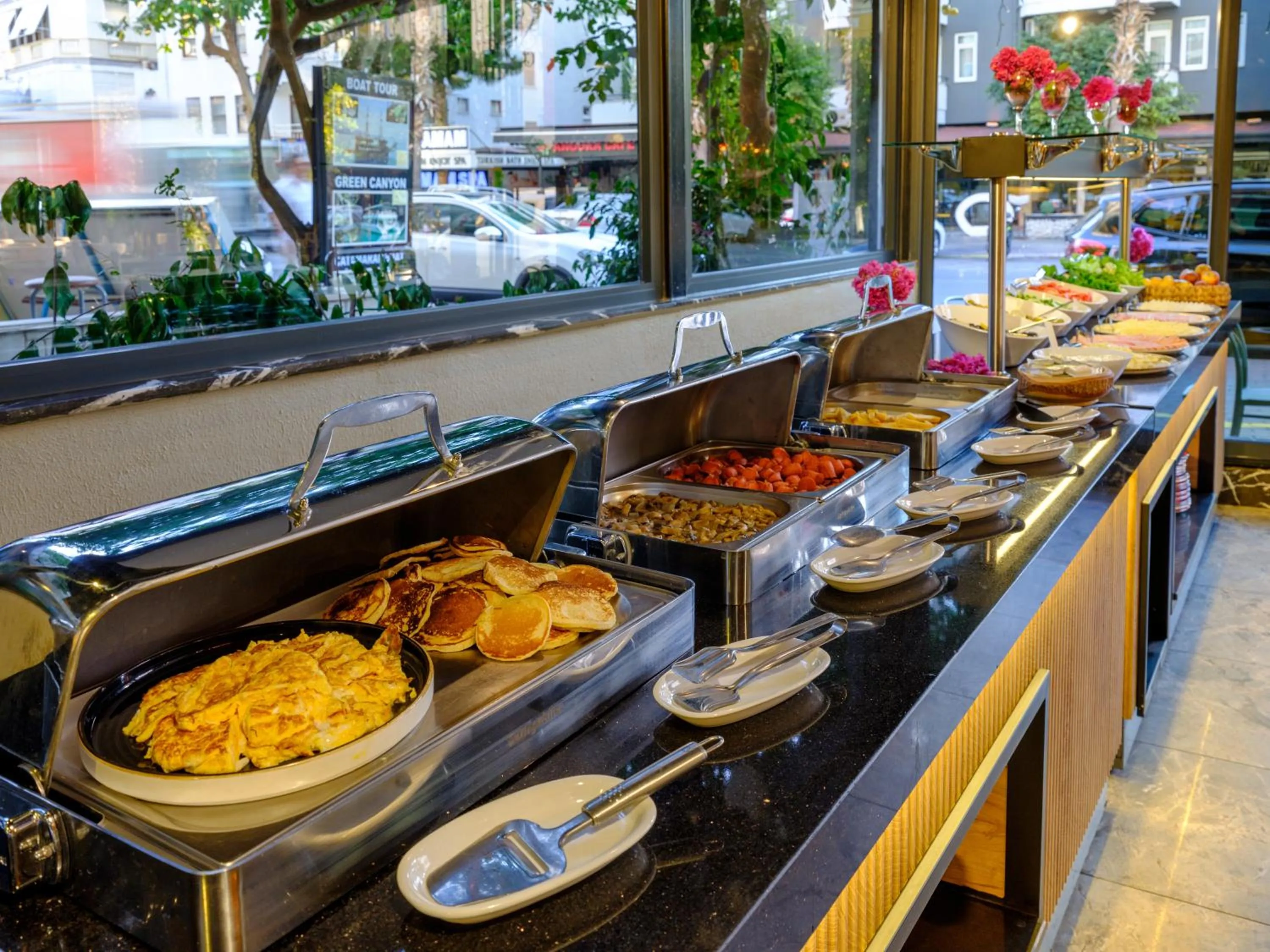 Buffet breakfast in Aria Riva Apart Hotel