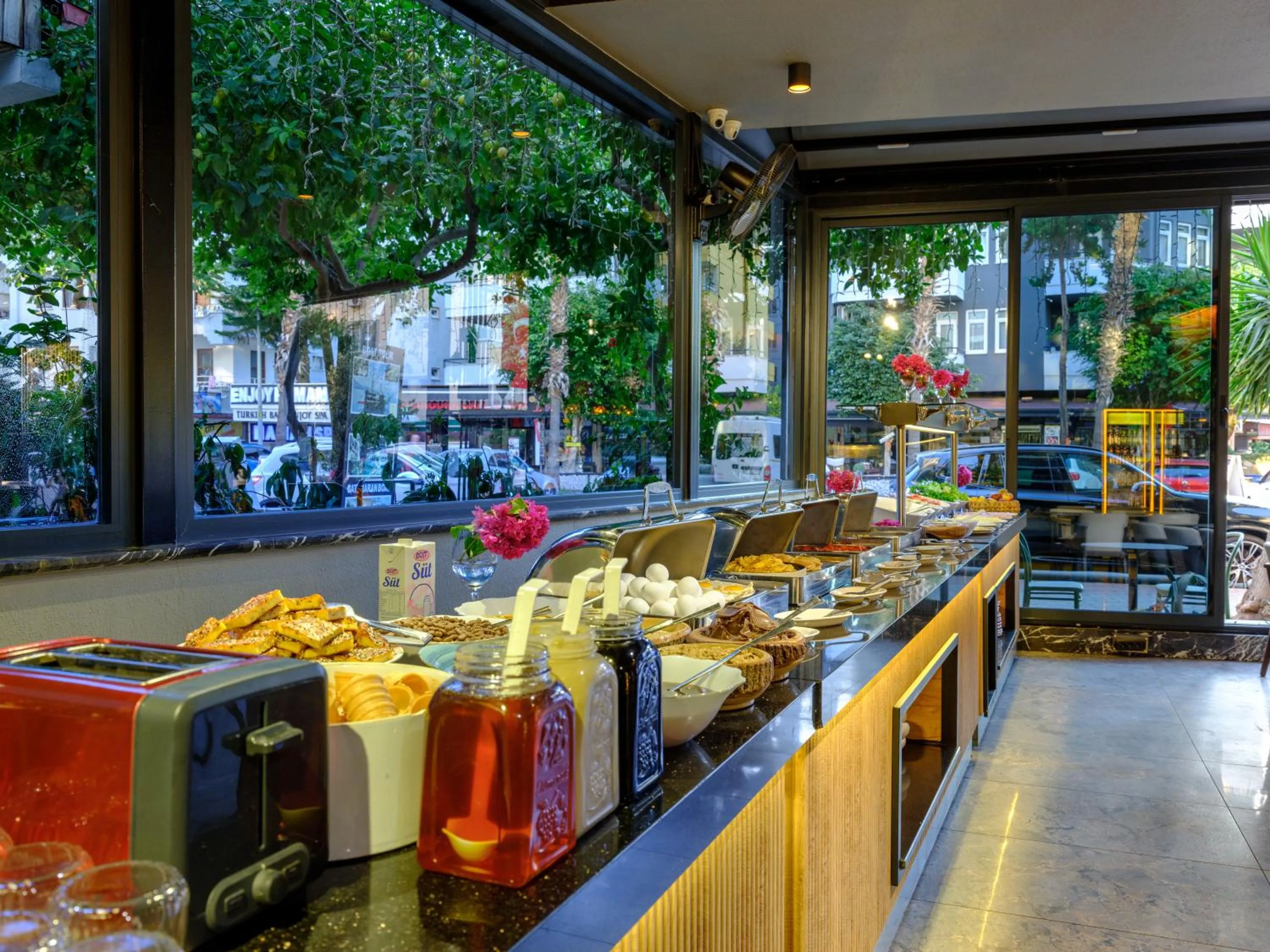 Buffet breakfast in Aria Riva Apart Hotel