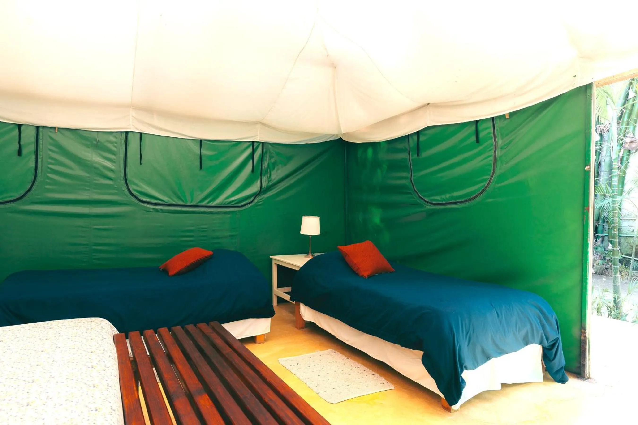 Bed in Junto al Rio Bungalows & Suites