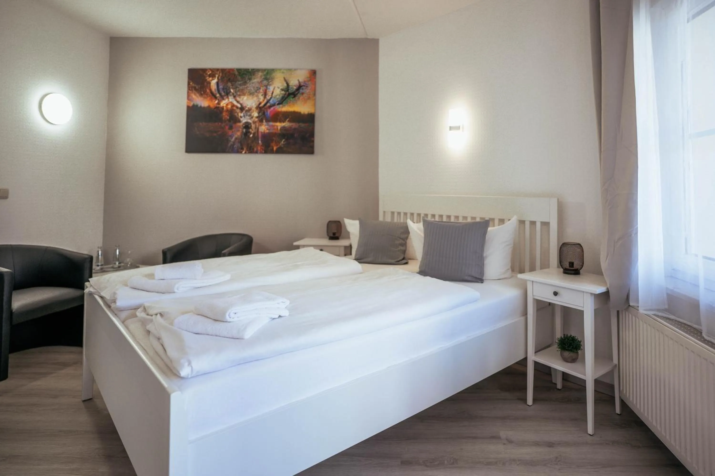 Photo of the whole room, Bed in REGIOHOTEL Wolmirstedter Hof Wolmirstedt