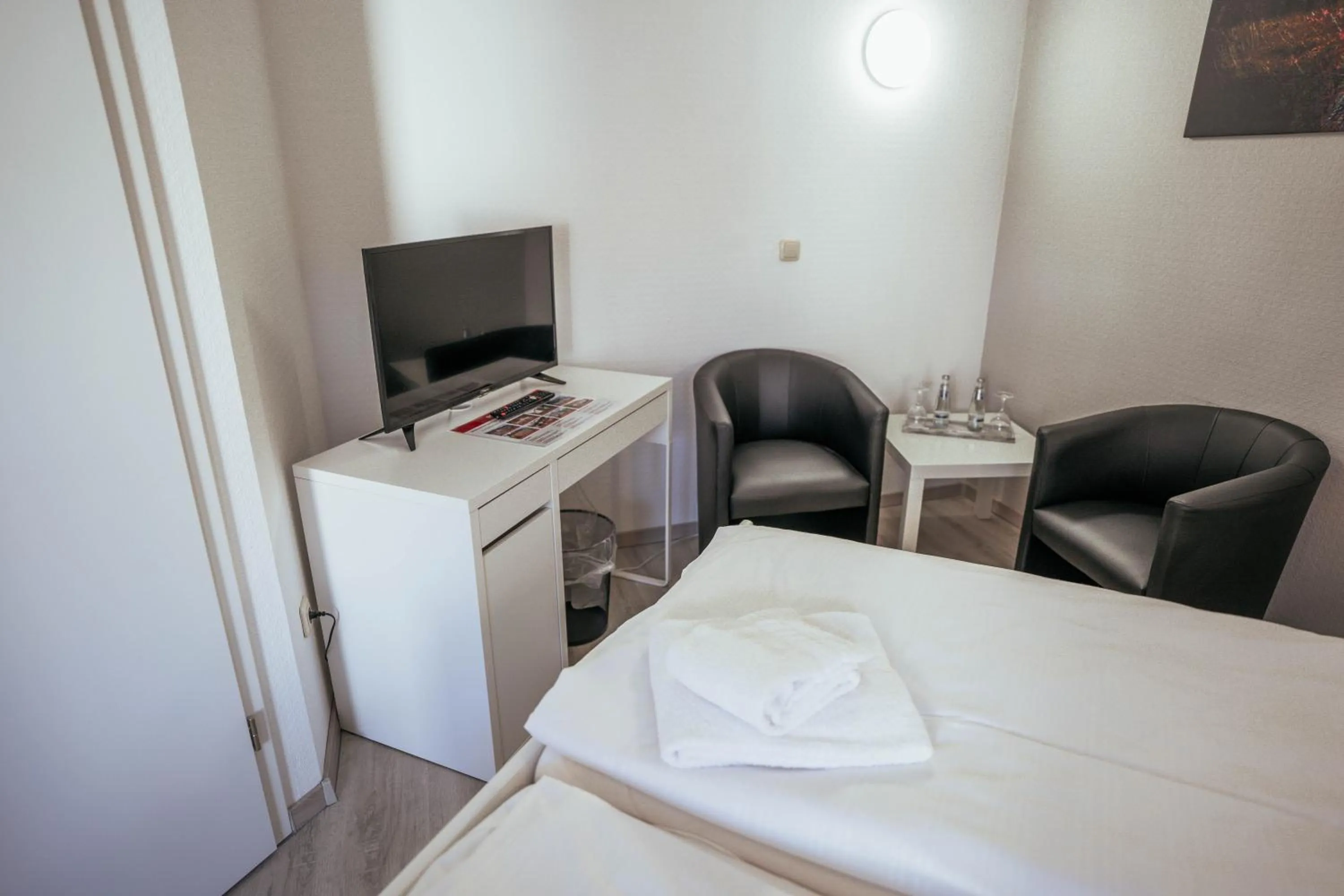 Seating area, Bed in REGIOHOTEL Wolmirstedter Hof Wolmirstedt