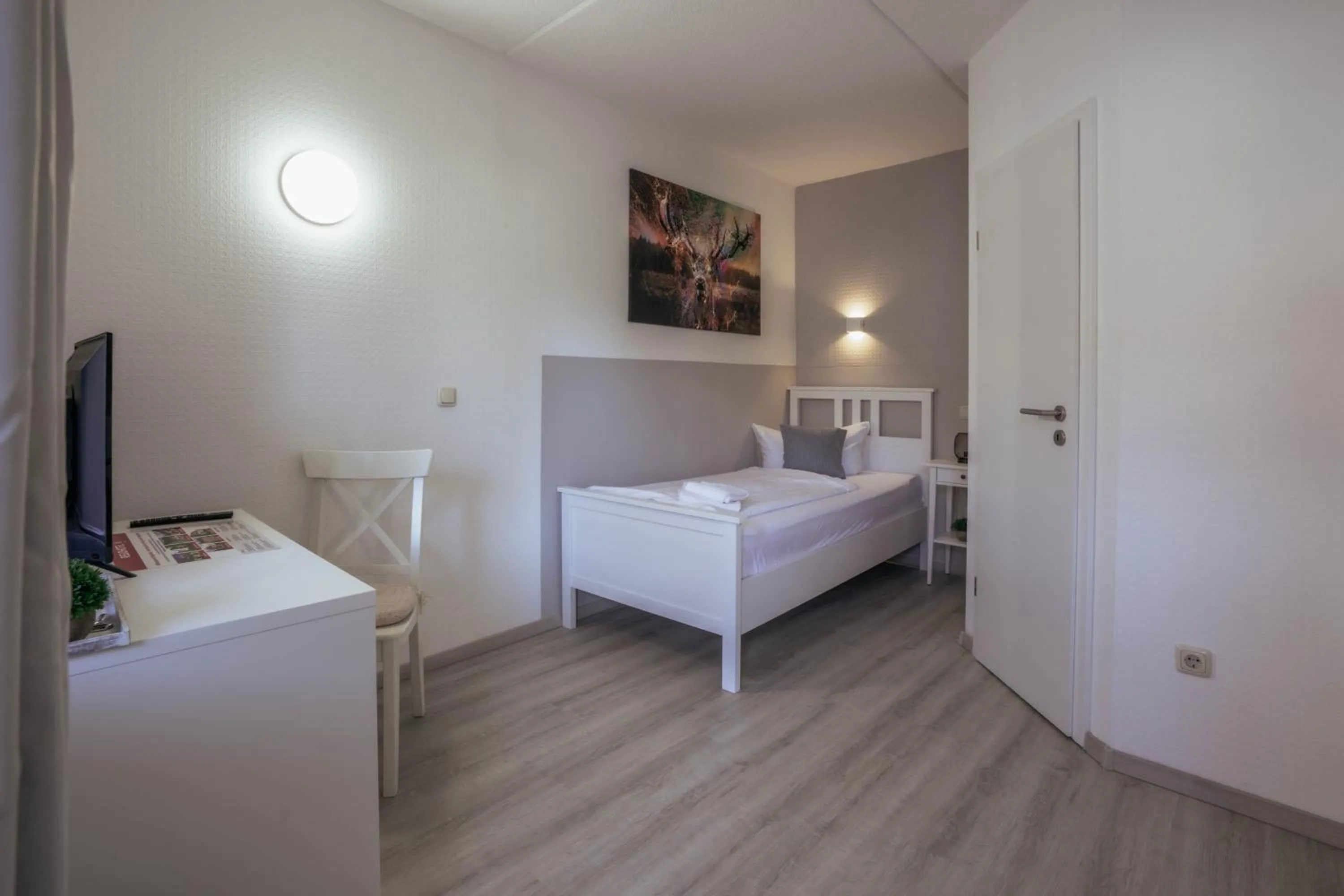 Bed in REGIOHOTEL Wolmirstedter Hof Wolmirstedt