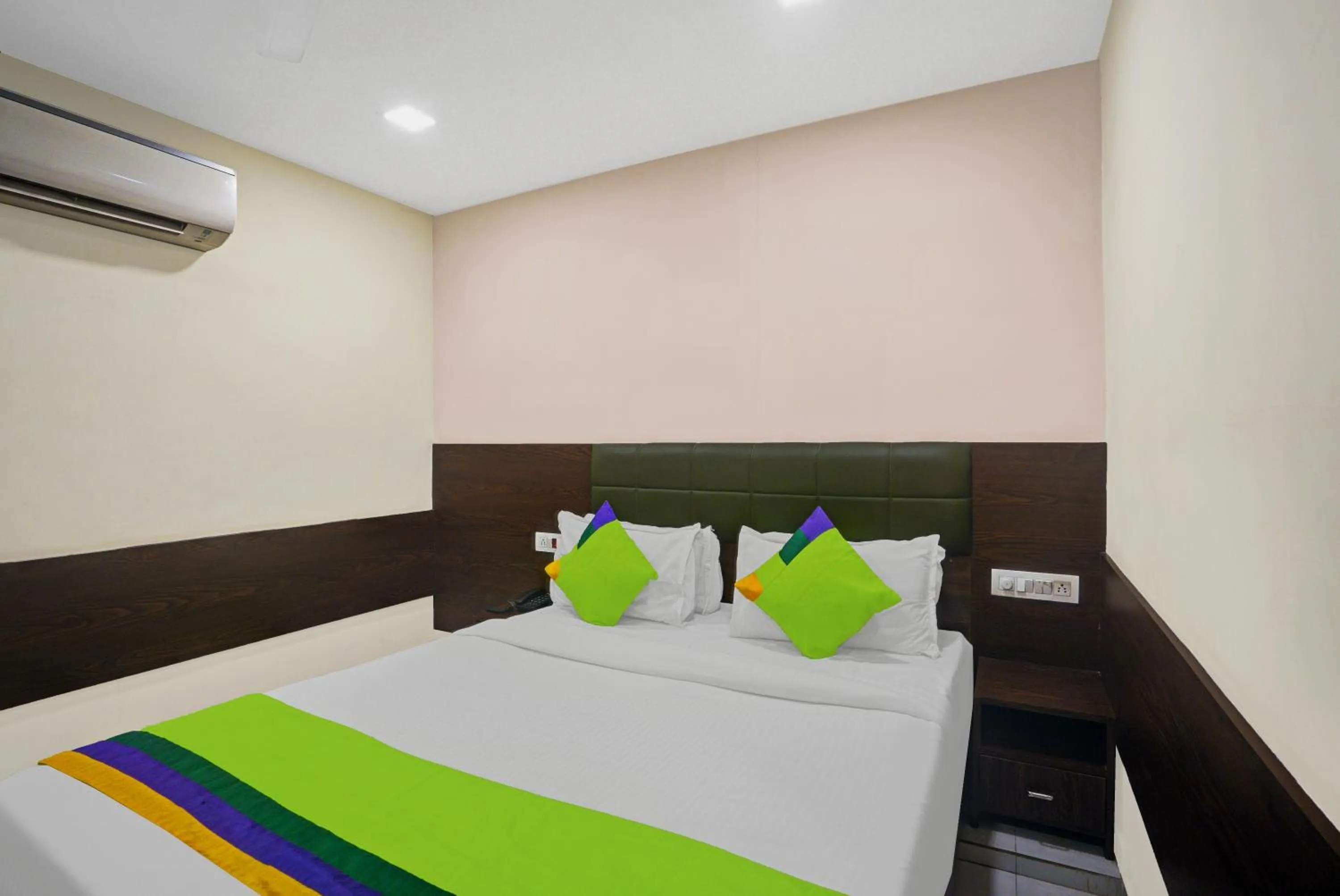 Bed in Greenotel Rooms Hazira, Surat