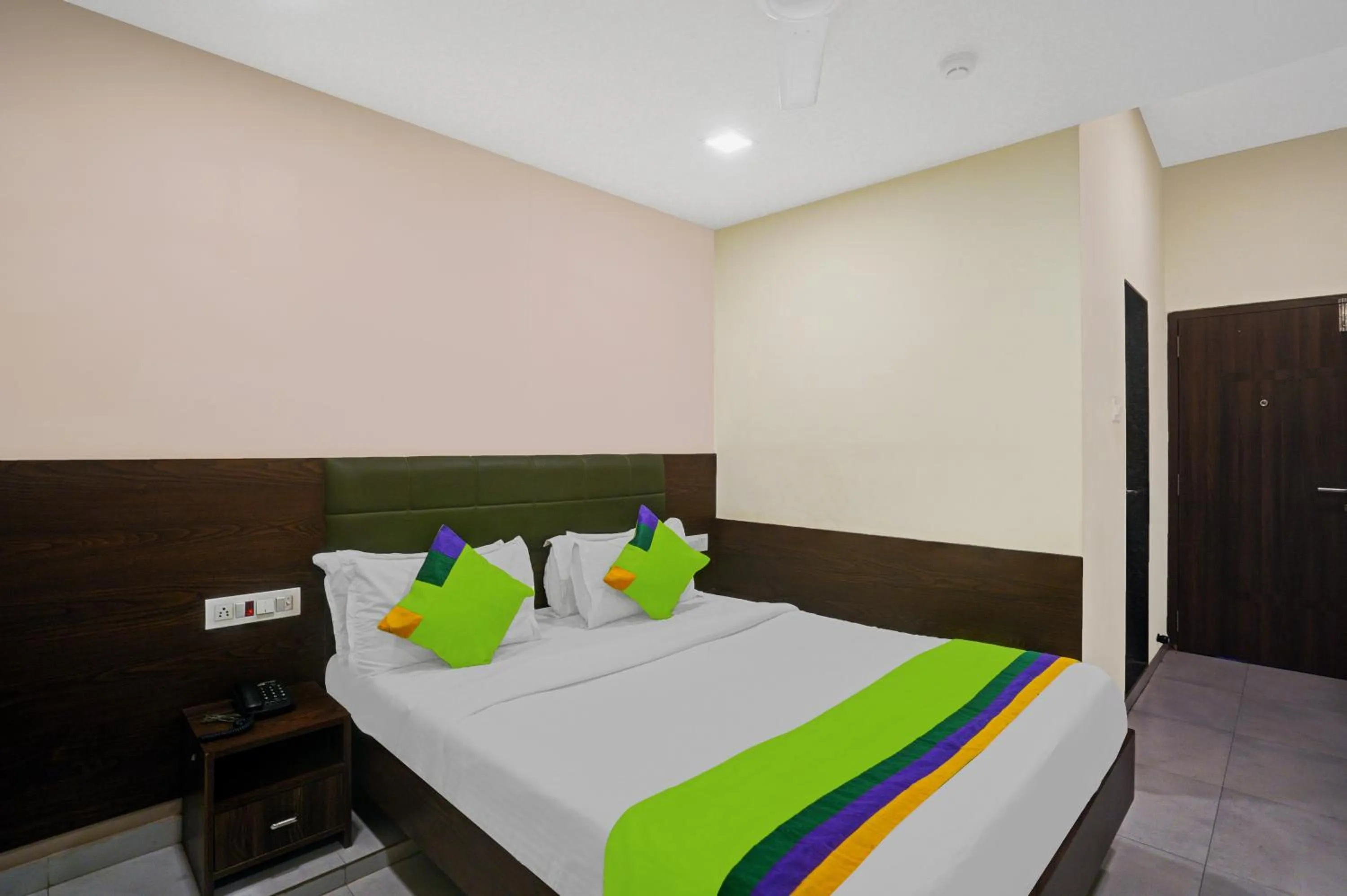 Bed in Greenotel Rooms Hazira, Surat