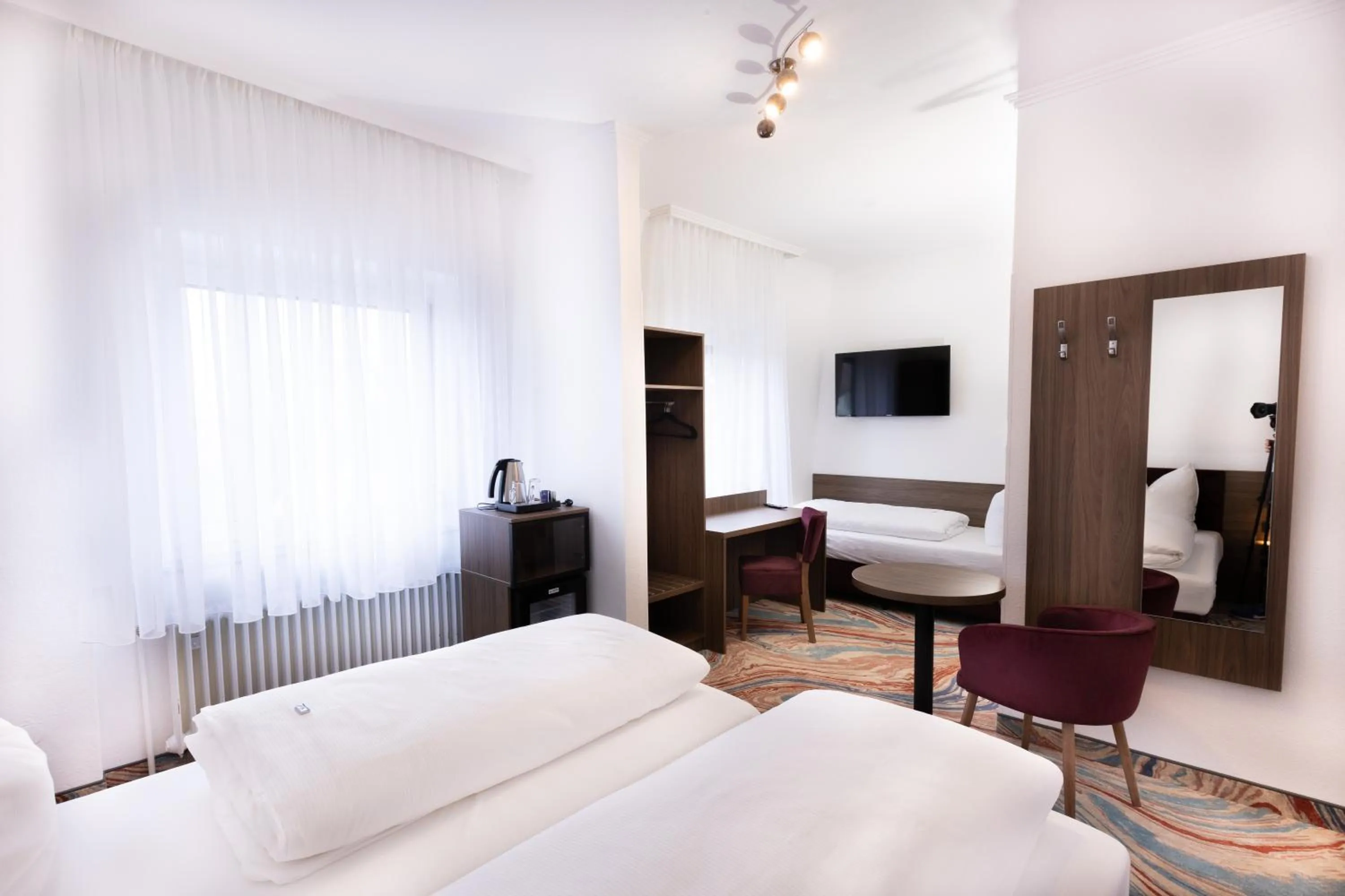 Photo of the whole room, Bed in Firzlaff's Hotel