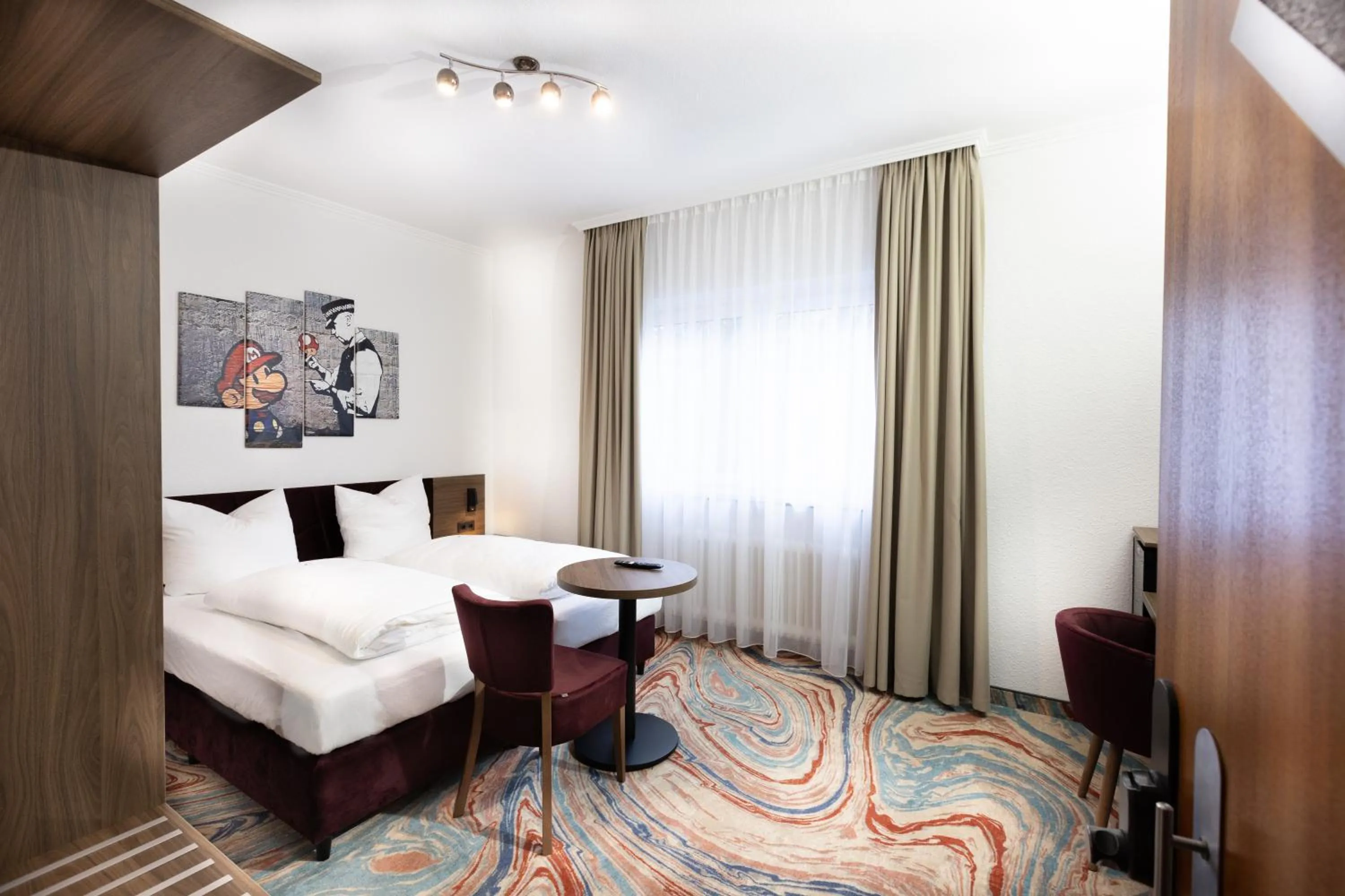 Photo of the whole room, Bed in Firzlaff's Hotel