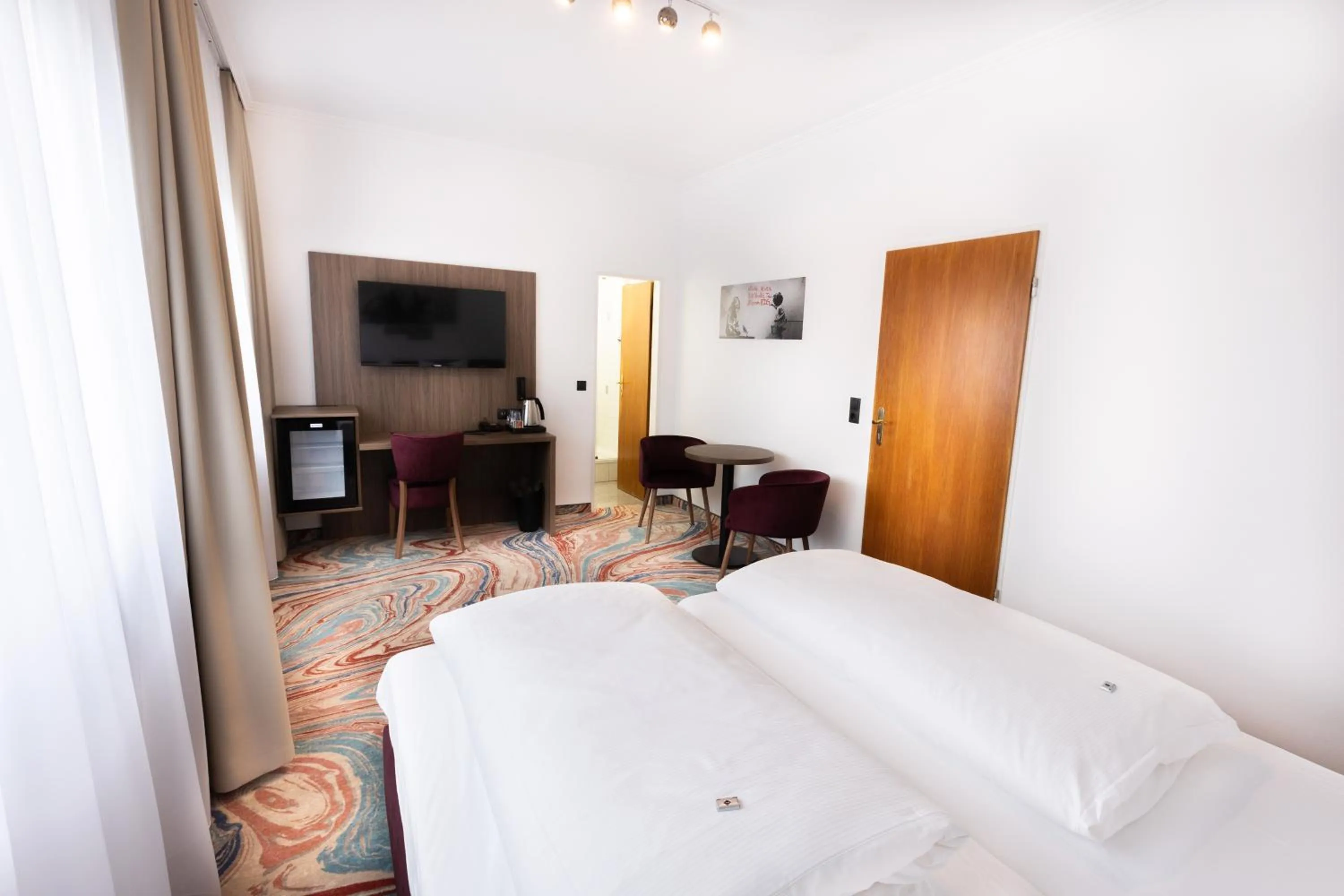 Photo of the whole room, Bed in Firzlaff's Hotel