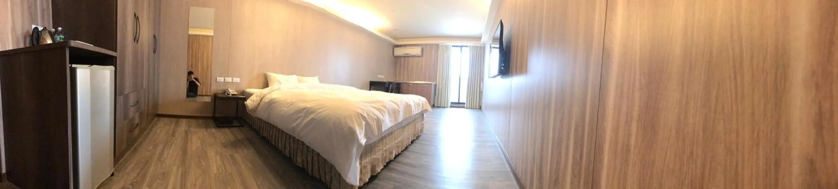 Bed in Tai Shinu Hotel