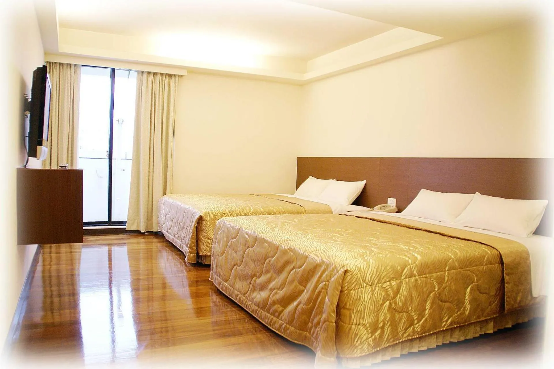 Bed in Tai Shinu Hotel