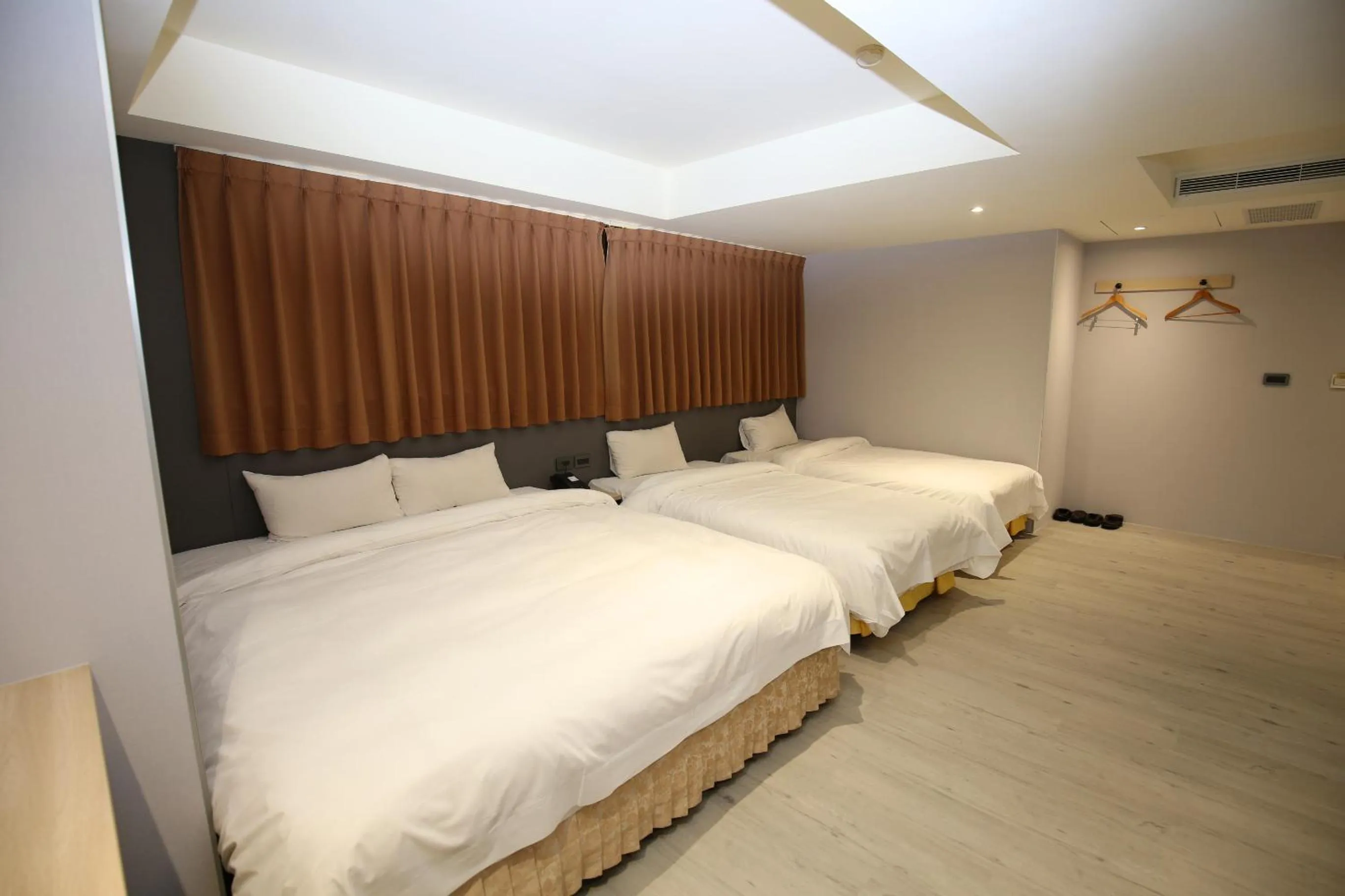 Bed in Tai Shinu Hotel