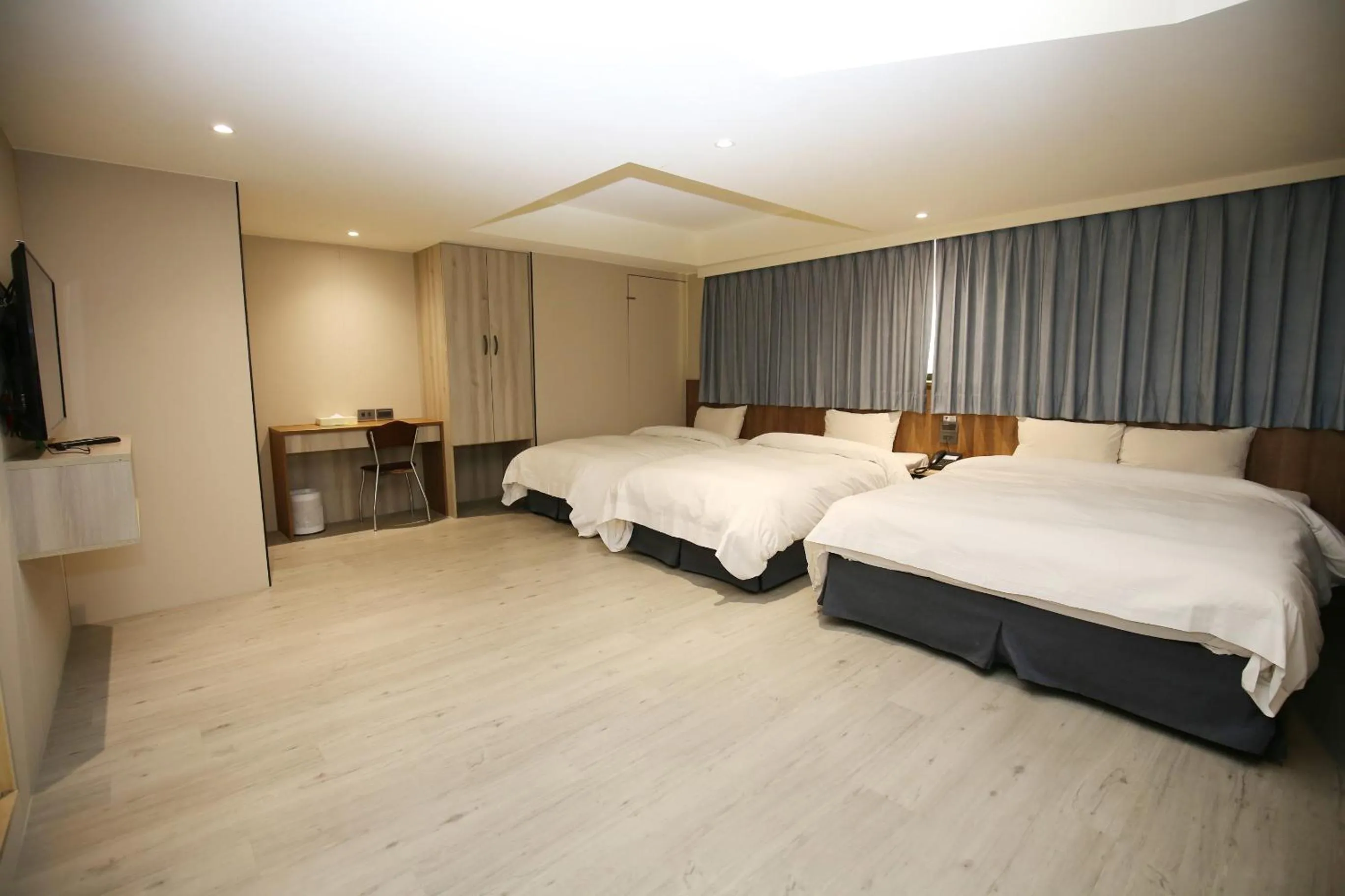 Bed in Tai Shinu Hotel