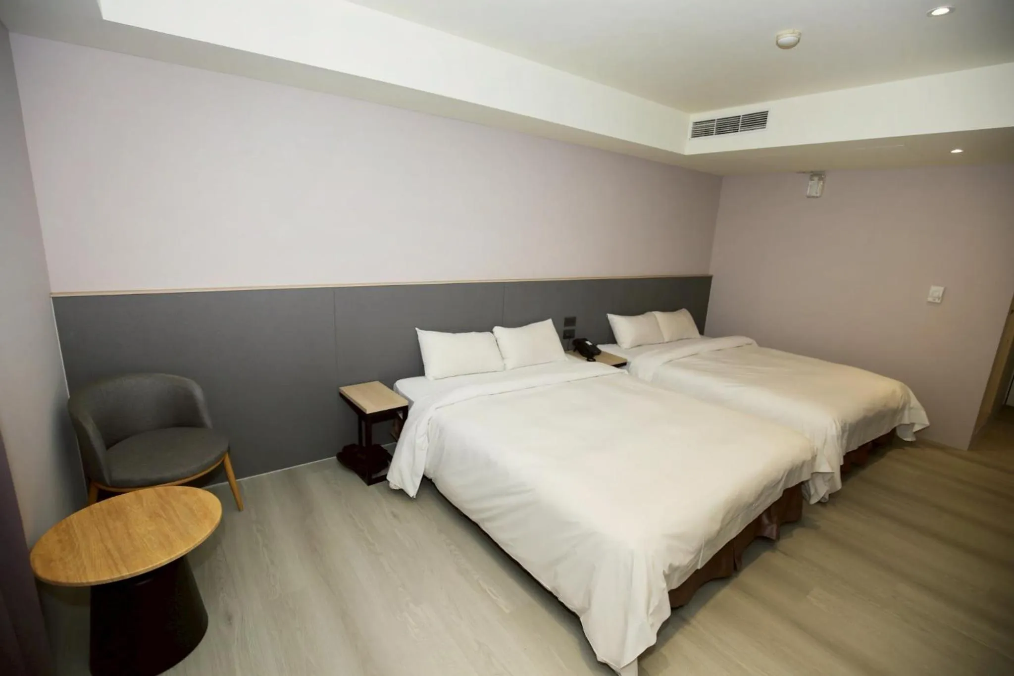 Bed in Tai Shinu Hotel