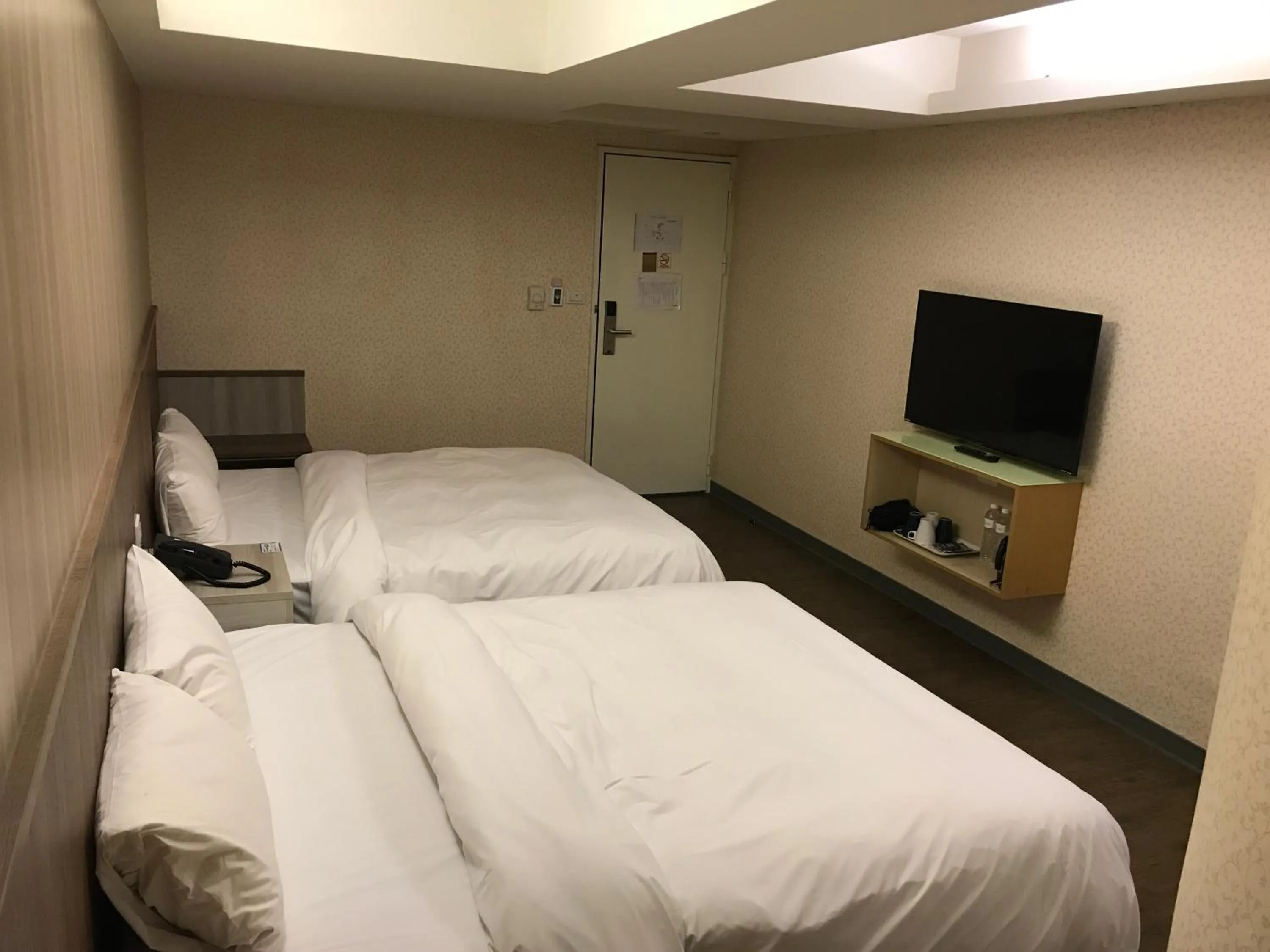 Bed in Tai Shinu Hotel