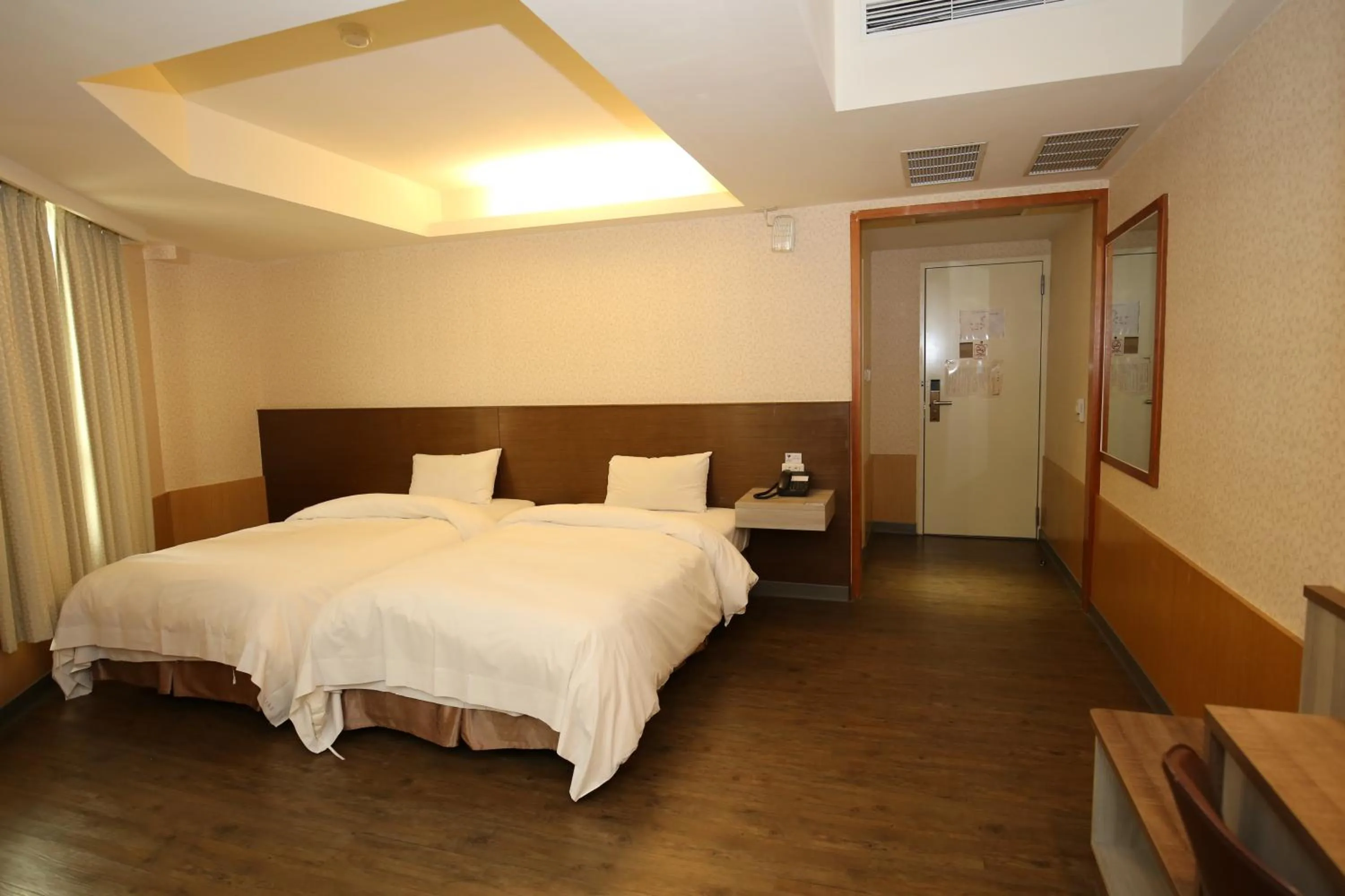 Bed in Tai Shinu Hotel