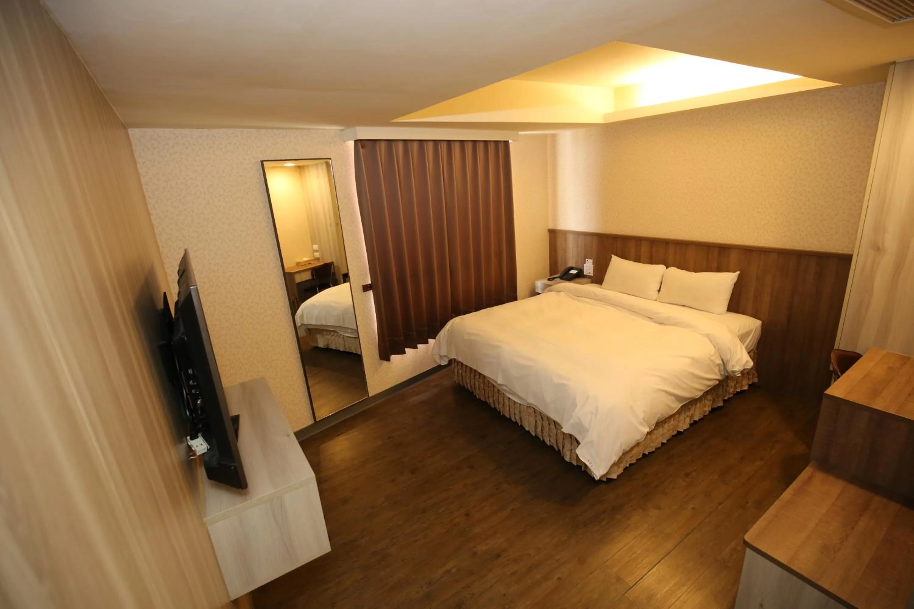 Bed in Tai Shinu Hotel