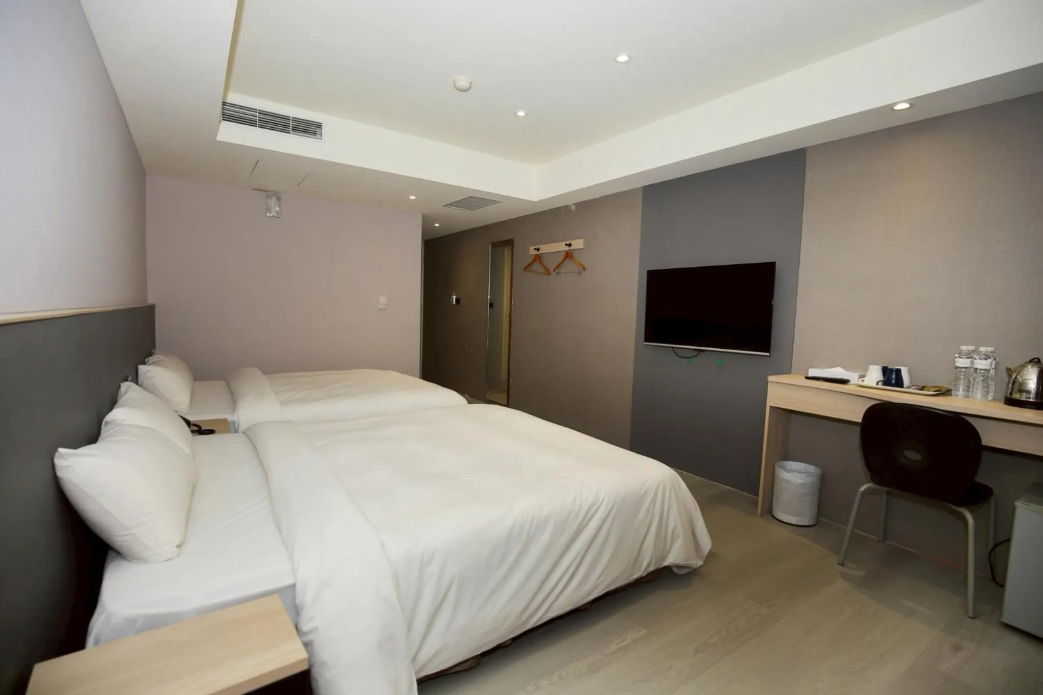 Bed in Tai Shinu Hotel