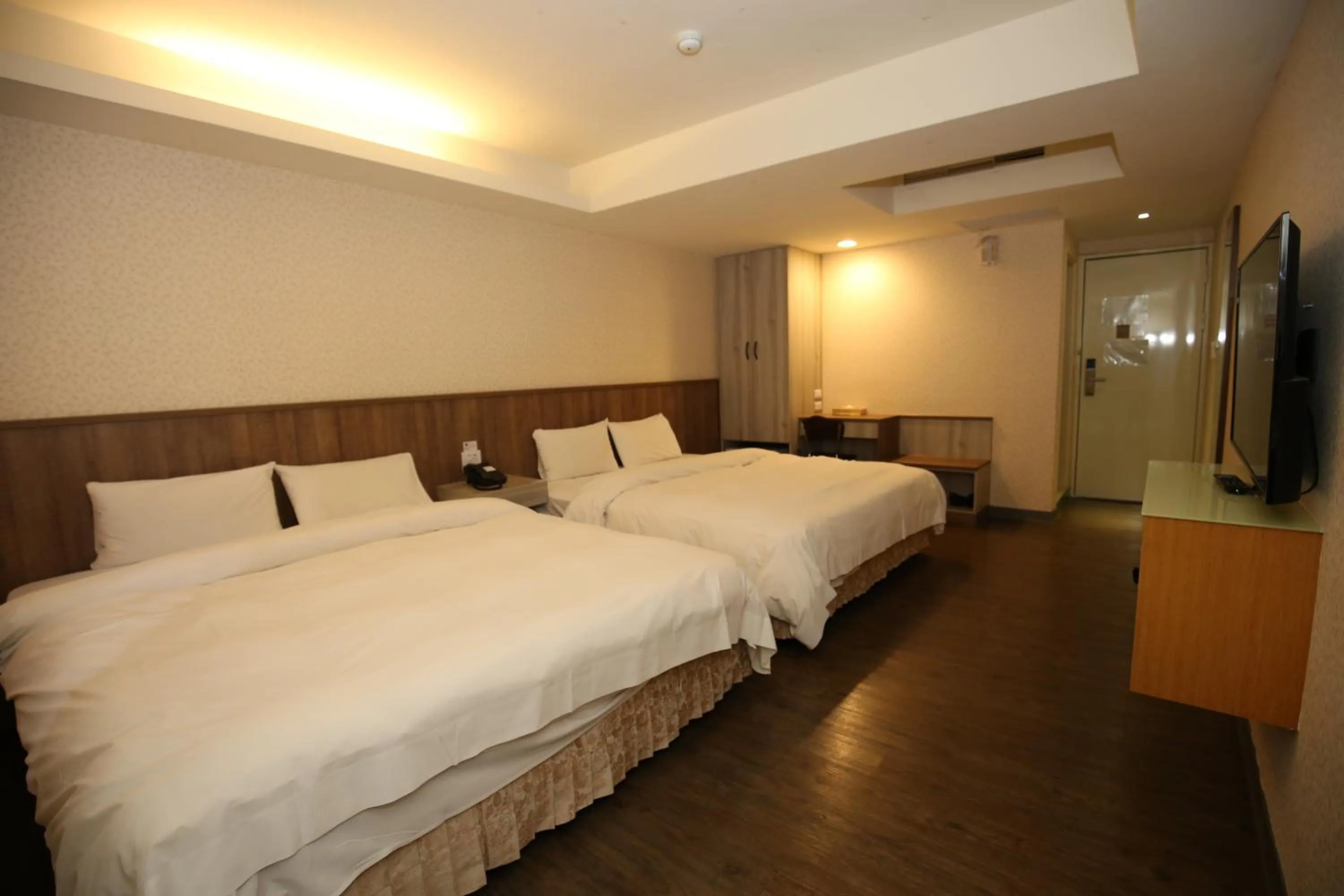 Bed in Tai Shinu Hotel