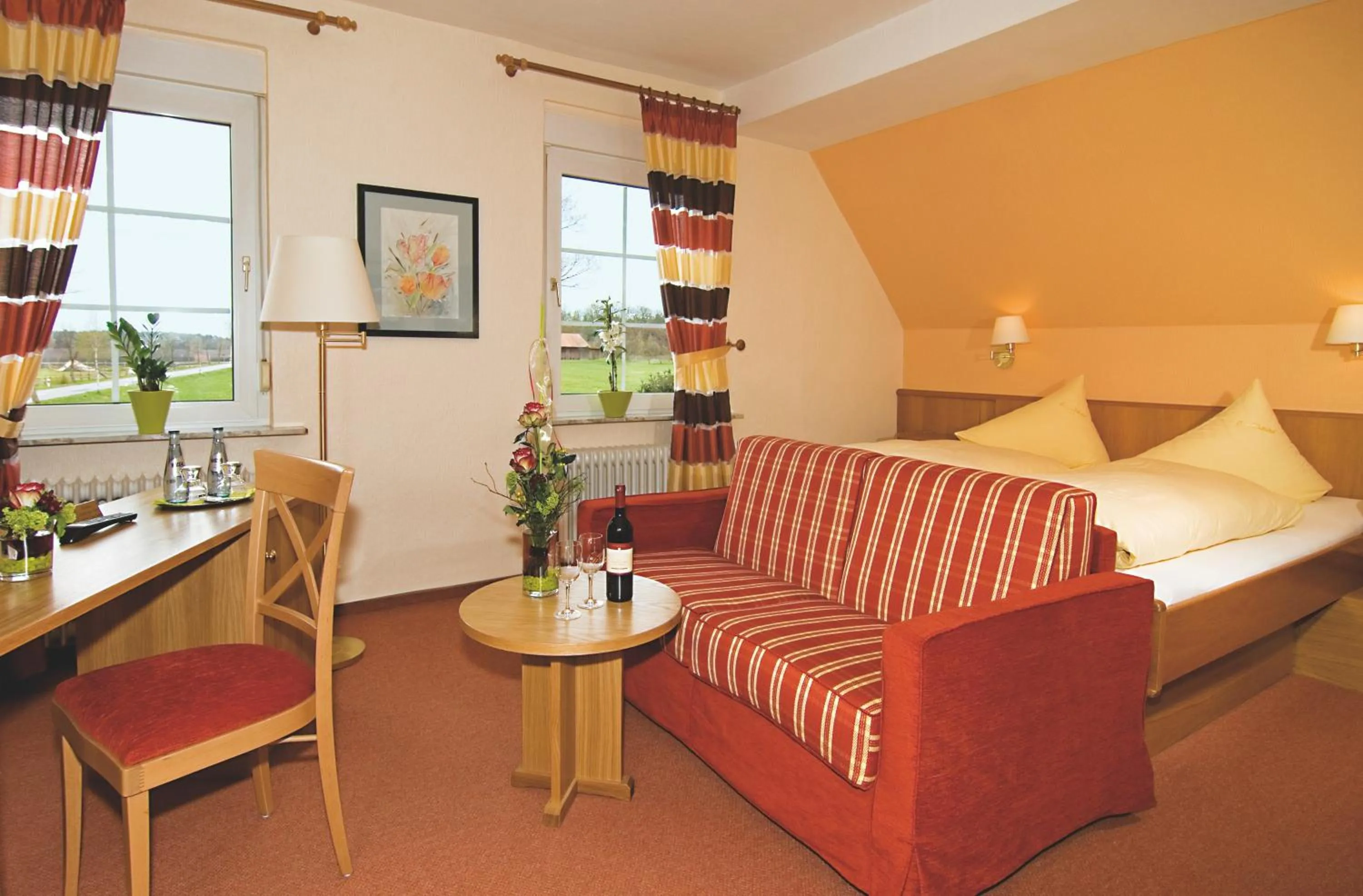 Photo of the whole room, Bed in Brammers Landhotel Zum Wietzetal