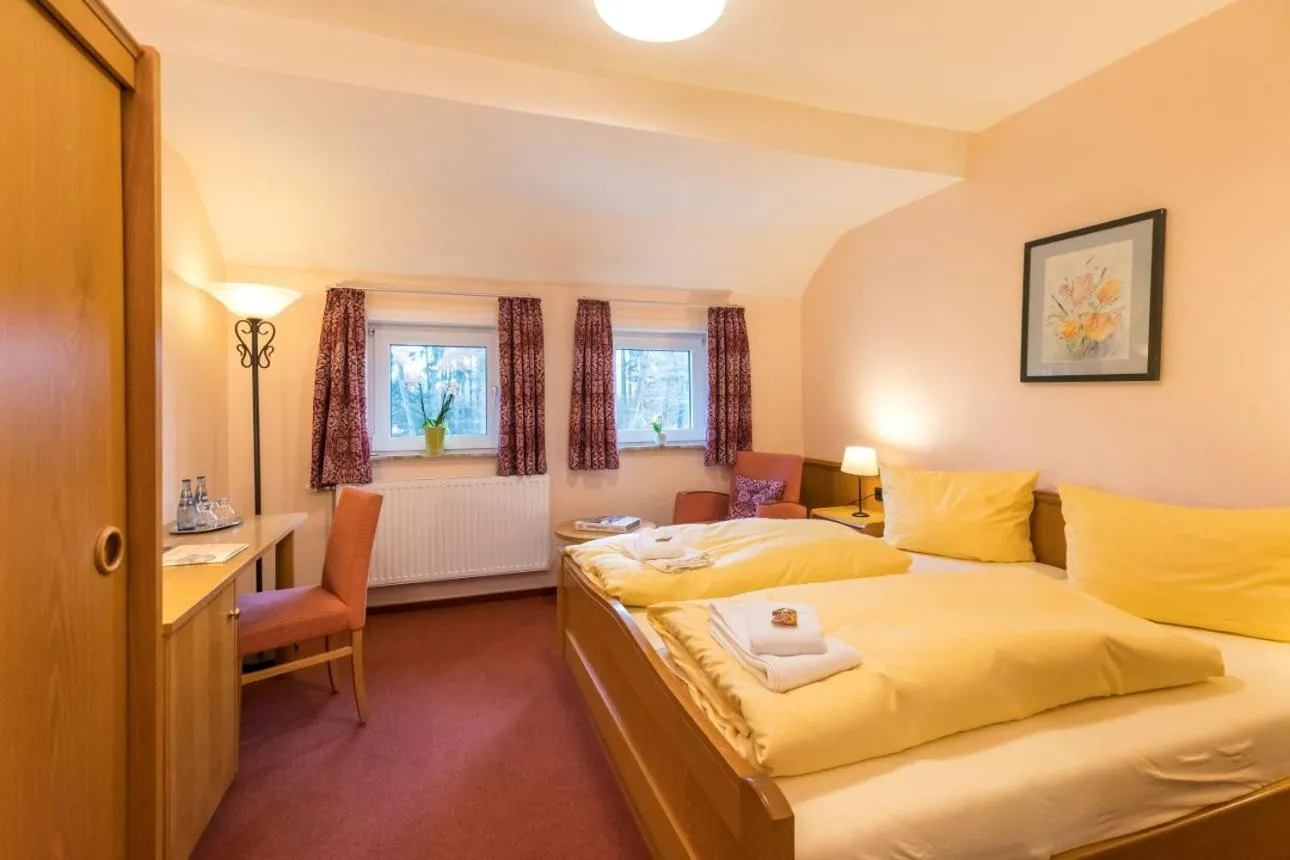 Bed in Brammers Landhotel Zum Wietzetal