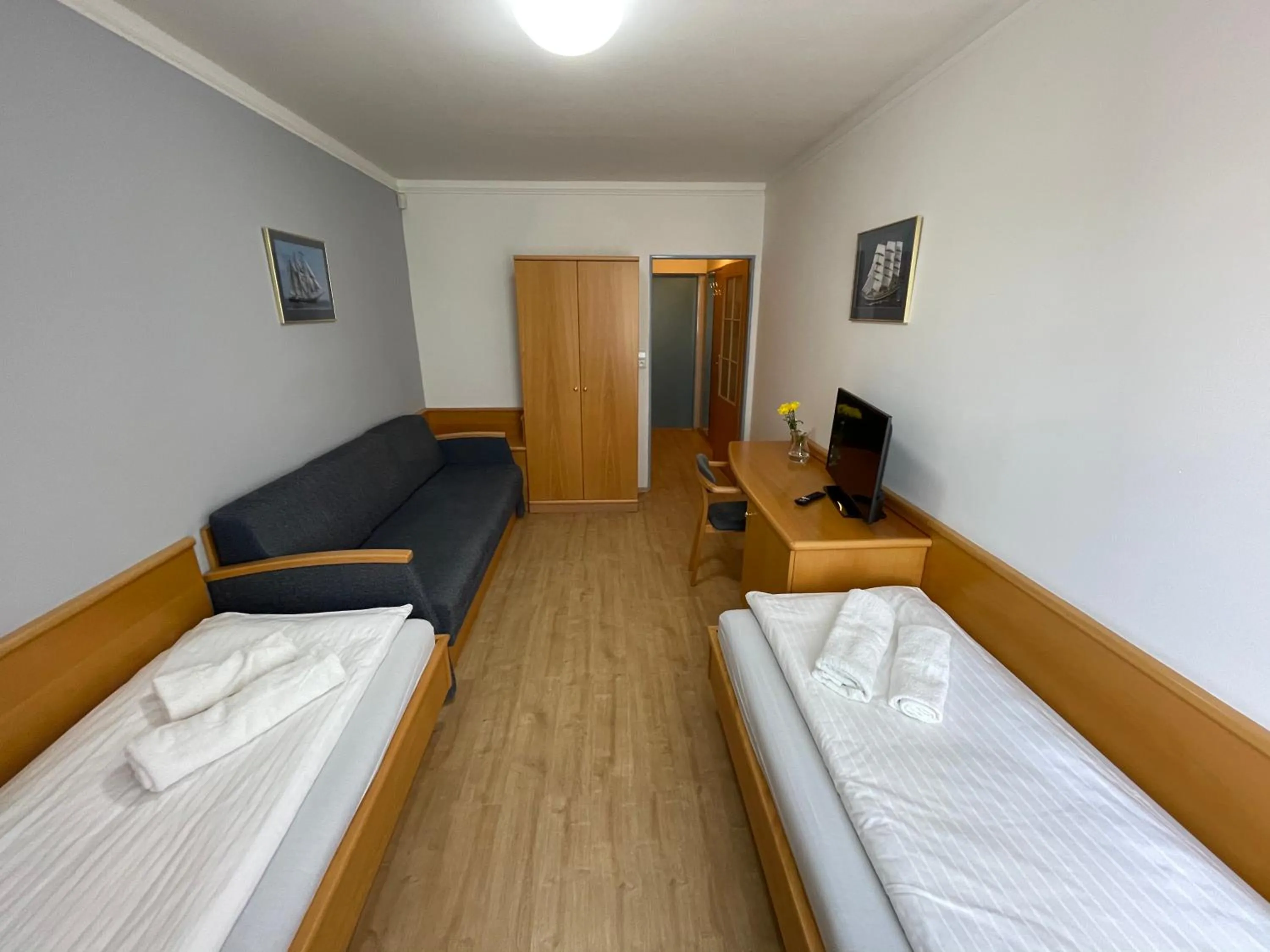 Photo of the whole room, Bed in Hotel Laguna & restaurant